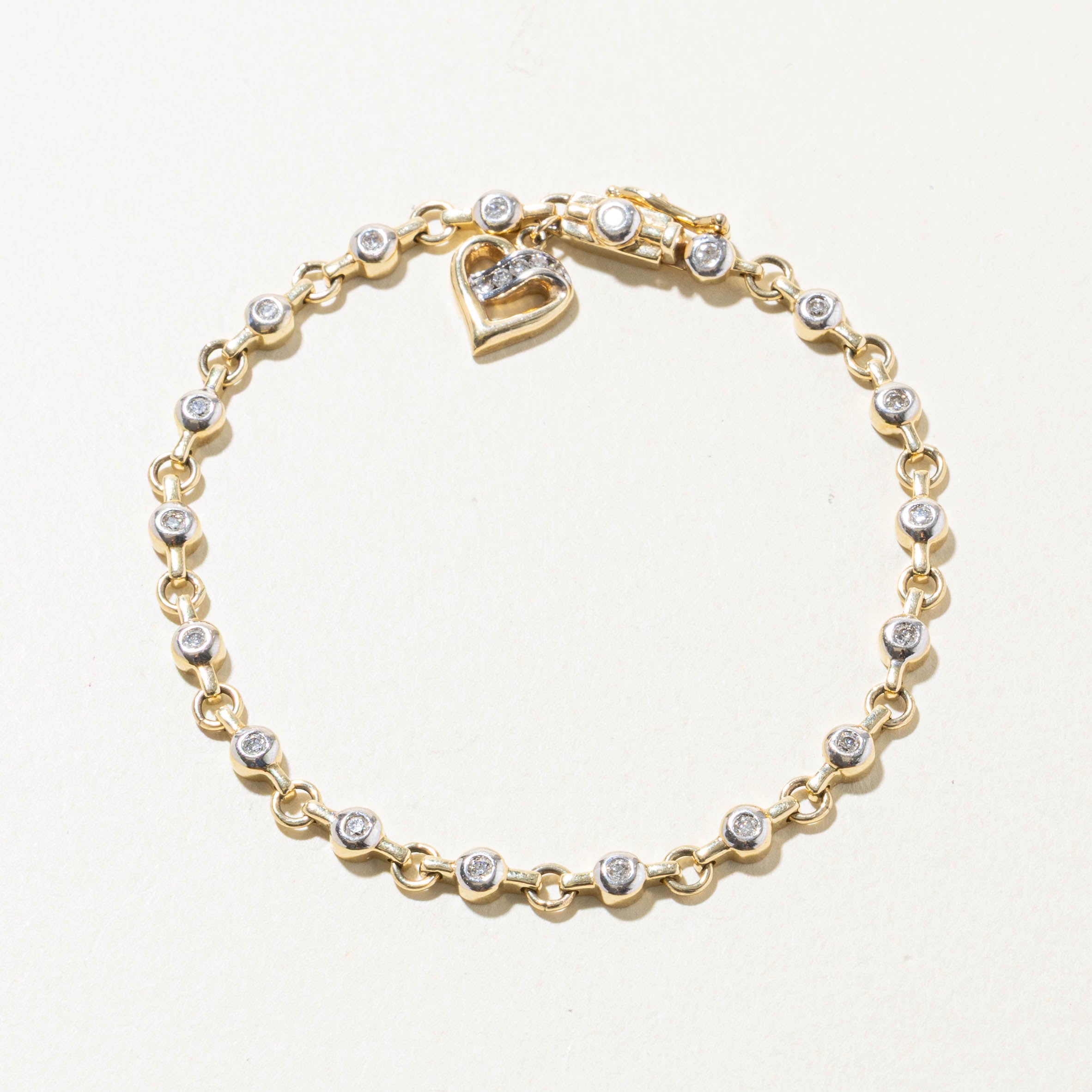 10k Two Tone Bezel Set Diamond Heart Charm Bracelet | 0.40ctw | 7.5"