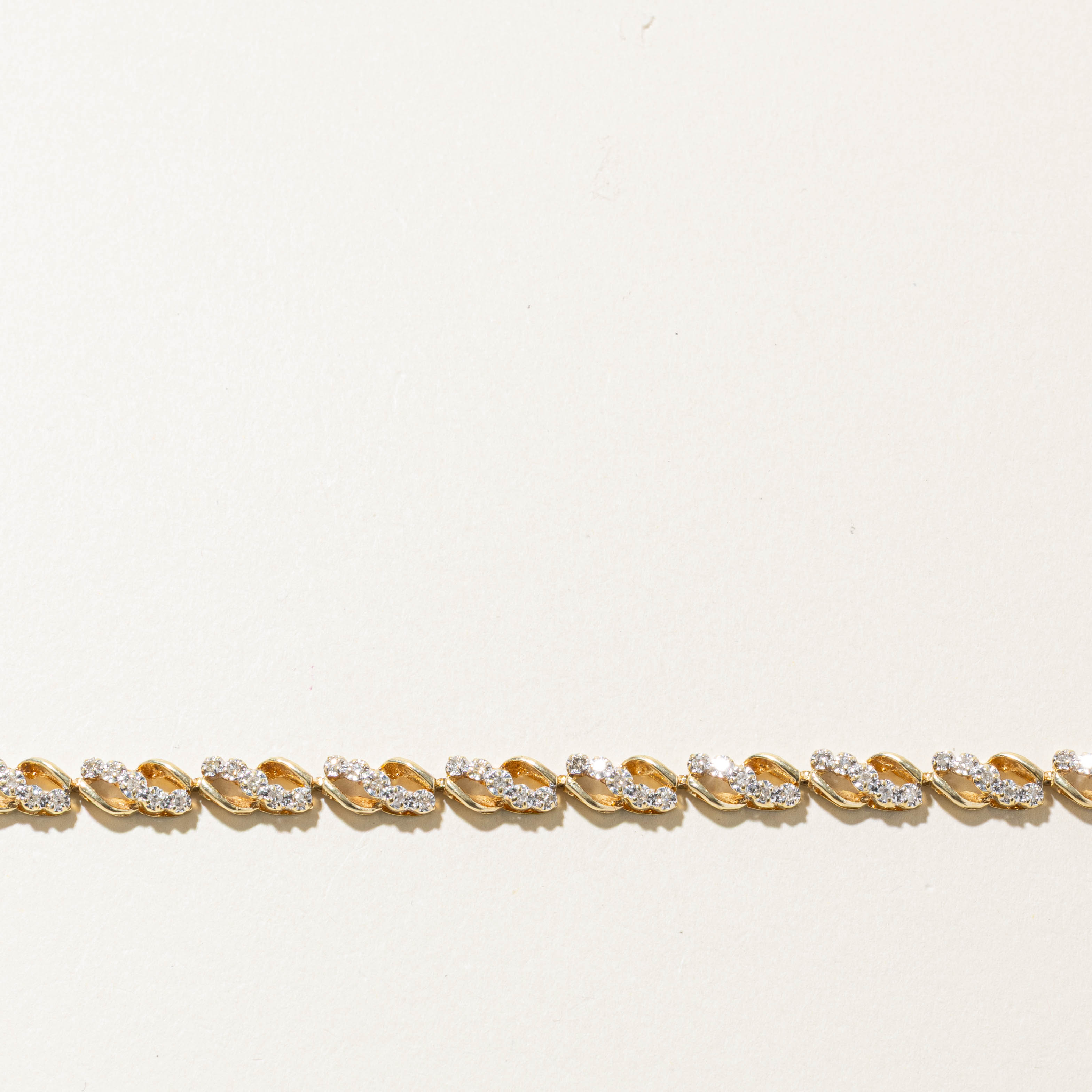 10k Diamond Twisted Wavy Tennis Bracelet | 0.75ctw | 7.5"