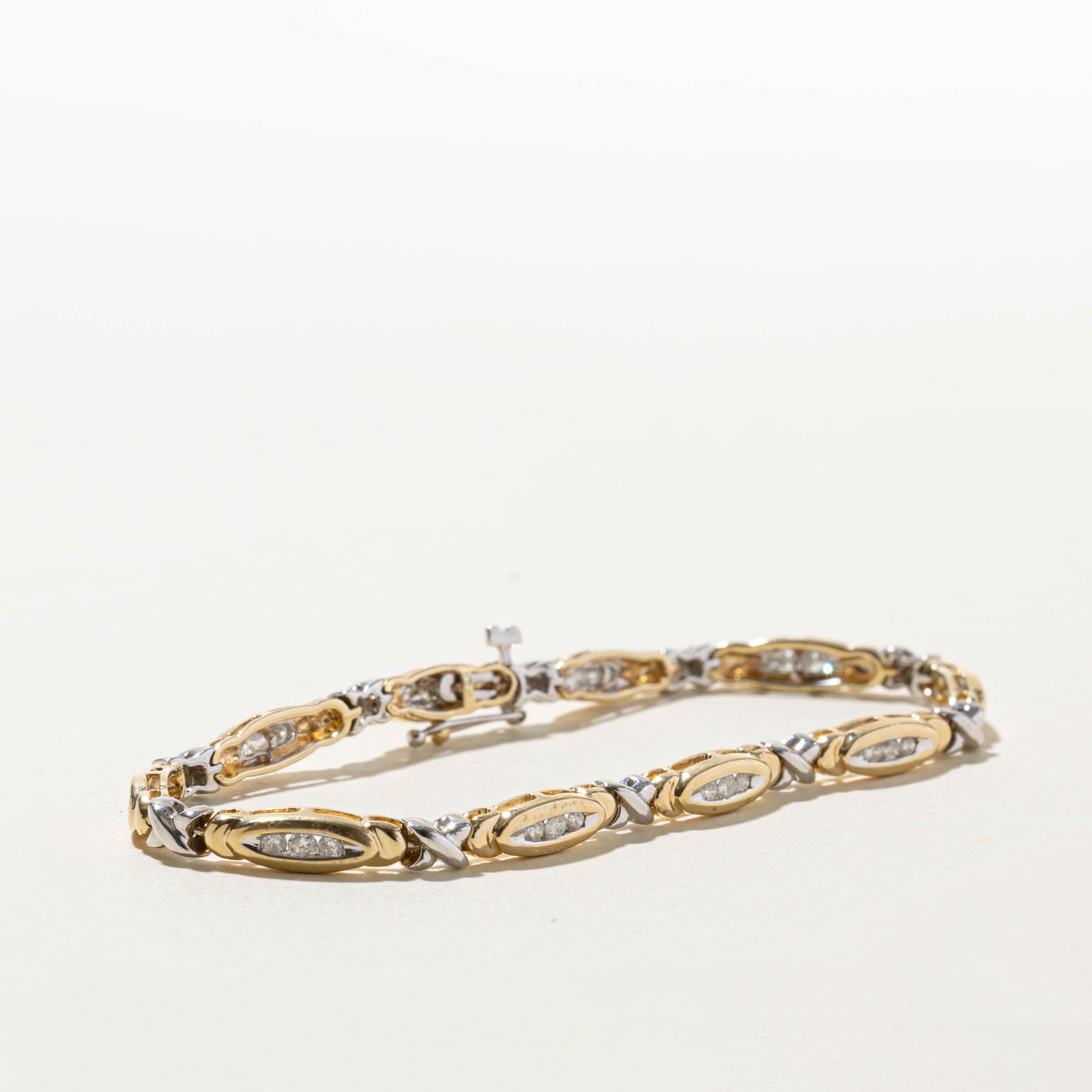 14k Two Tone Channel Set Diamond X Tennis Bracelet | 0.75ctw | 7.5"