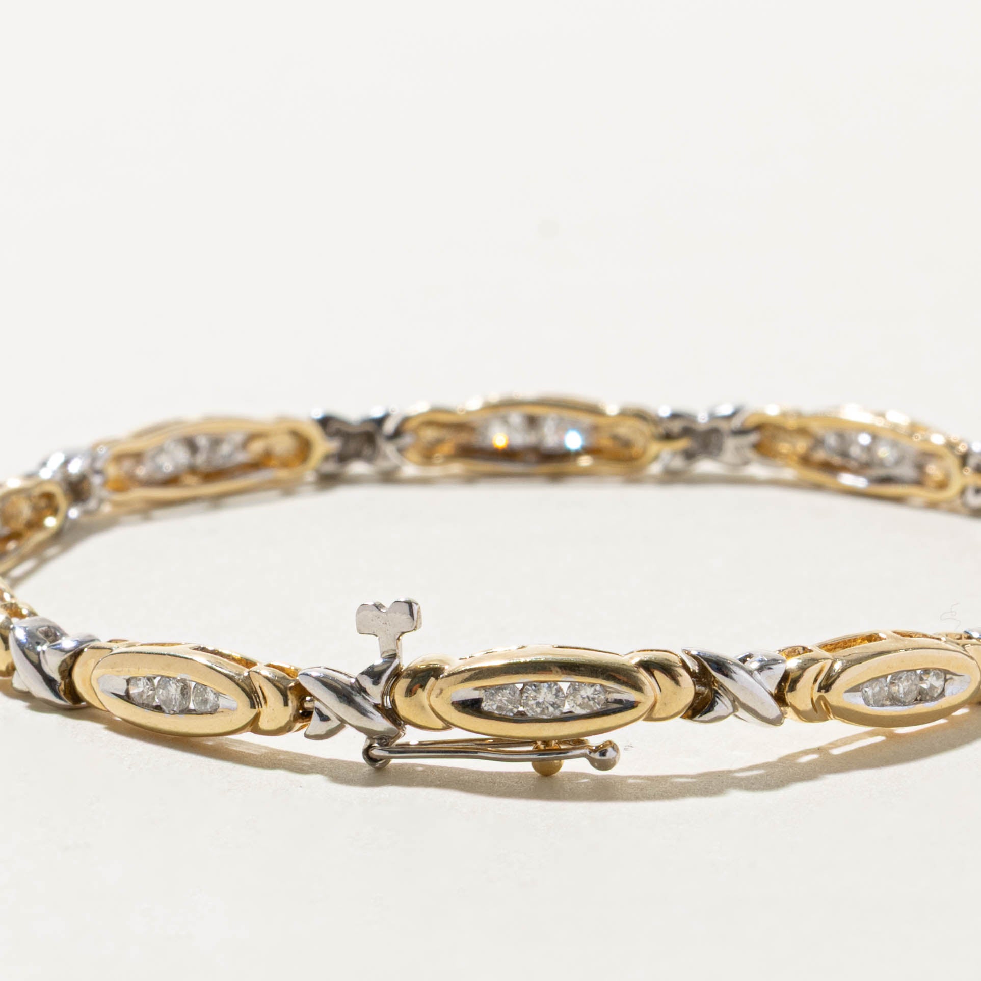 14k Two Tone Channel Set Diamond X Tennis Bracelet | 0.75ctw | 7.5"