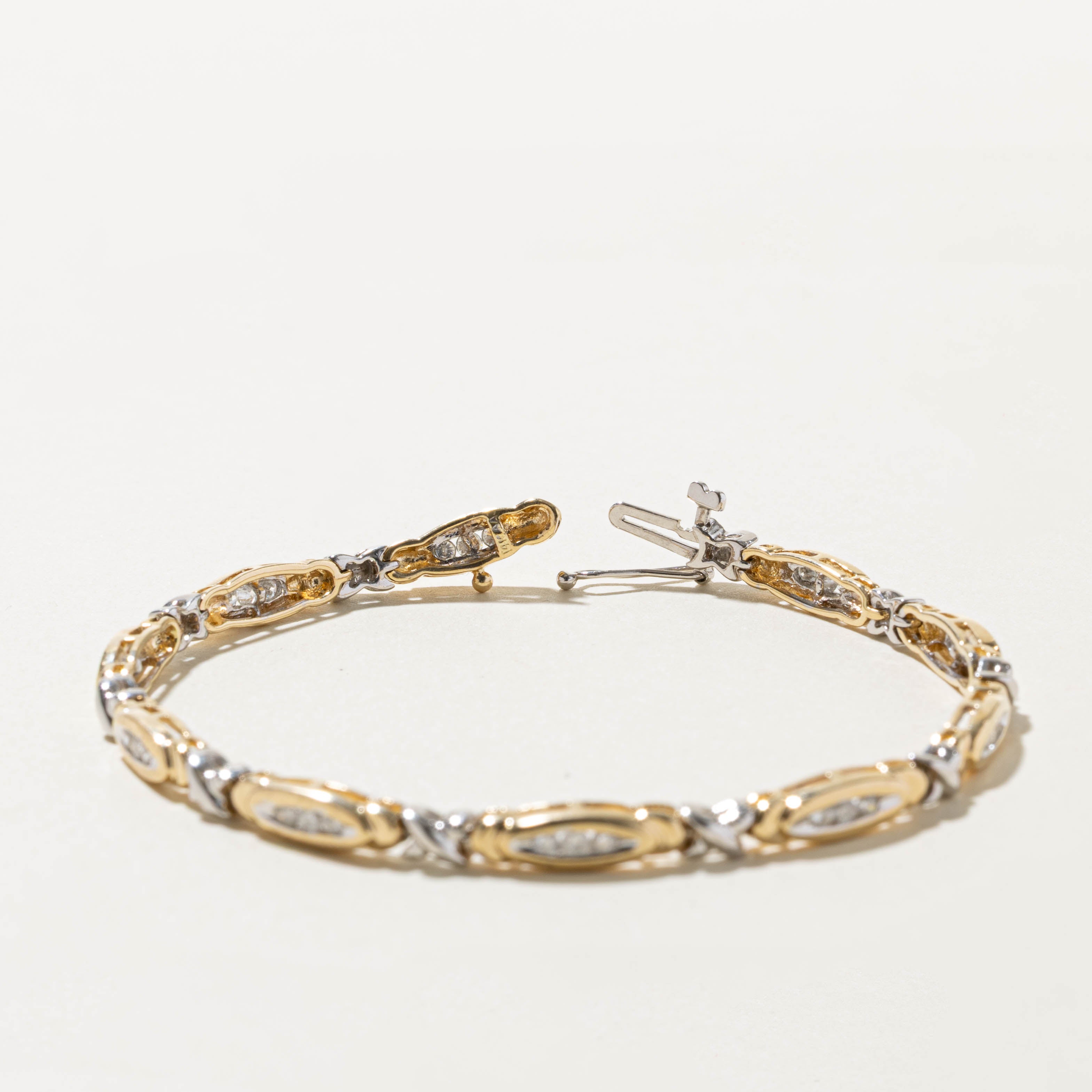 14k Two Tone Channel Set Diamond X Tennis Bracelet | 0.75ctw | 7.5"