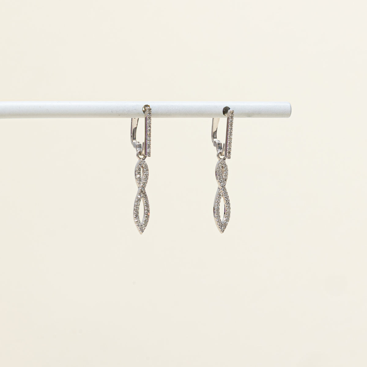 10k Diamond Accented Cross Over Drop Earrings | 0.09ctw