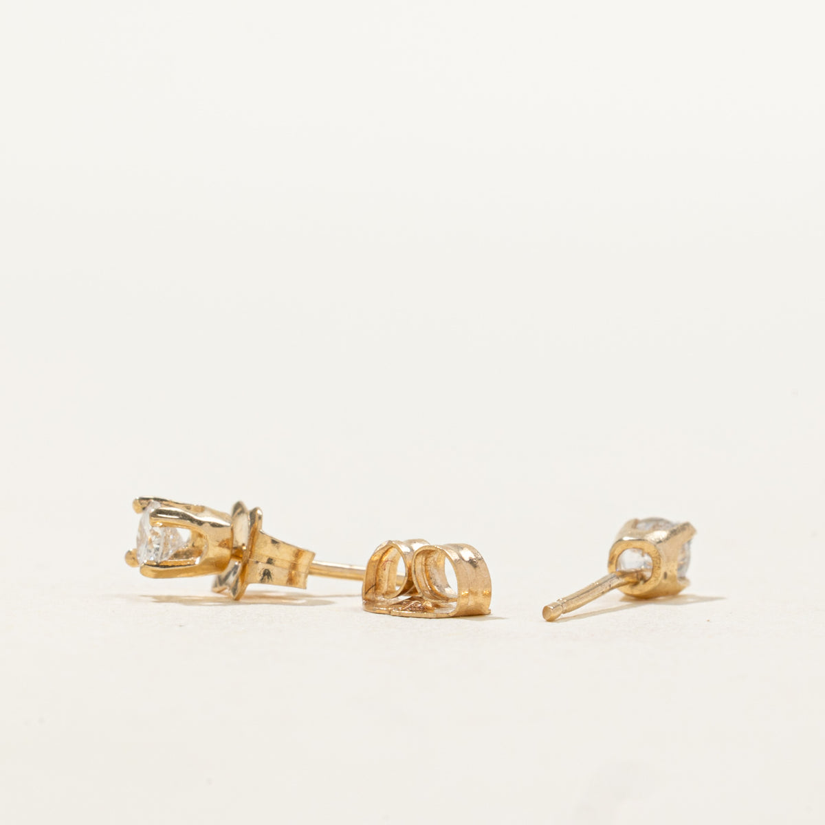14k Solitaire Petite Diamond Stud Earrings | 0.18ctw