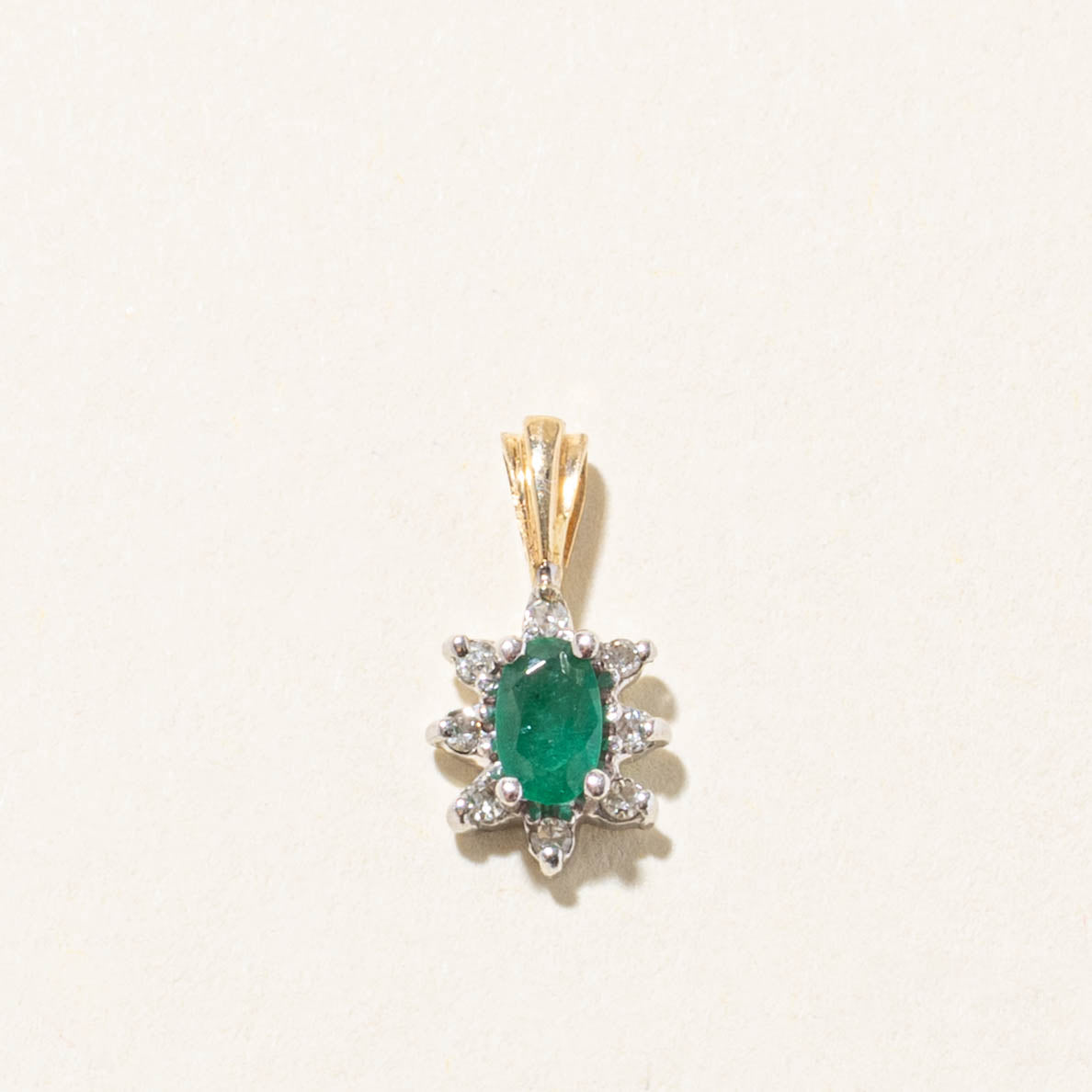 10k Oval Cut Emerald & Diamond Petal Halo Pendant | 0.18ct, 0.07ctw