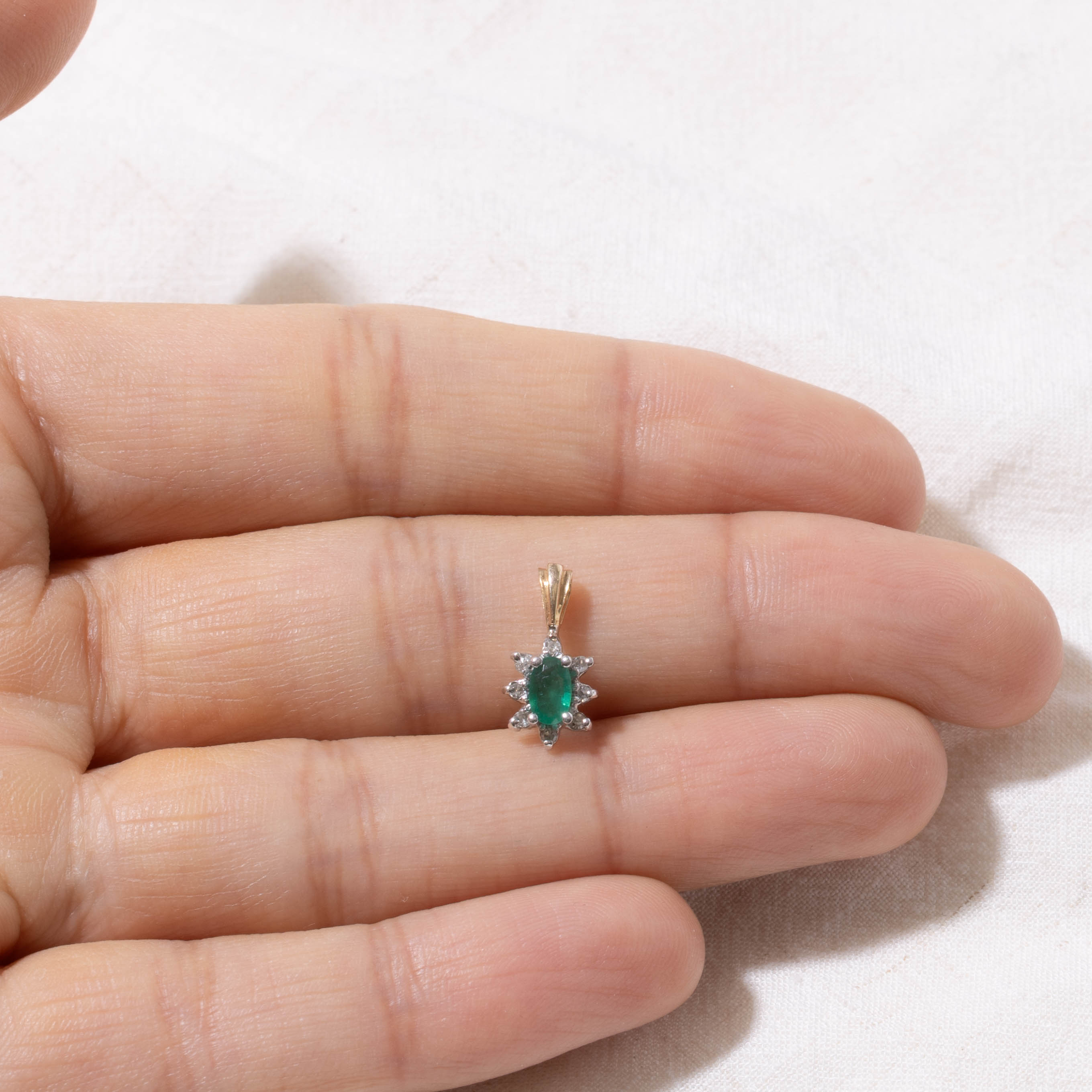10k Oval Cut Emerald & Diamond Petal Halo Pendant | 0.18ct, 0.07ctw
