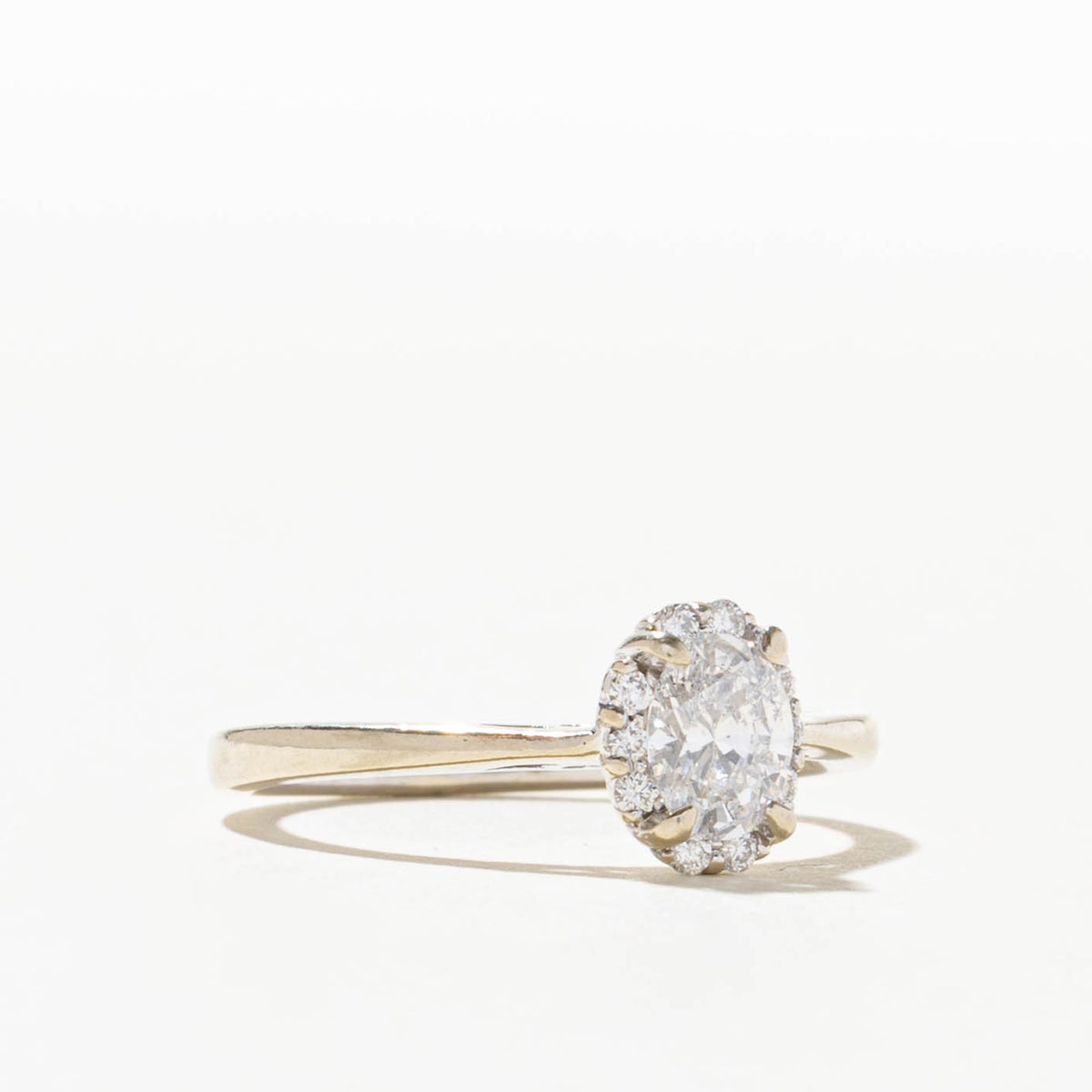 14k Oval Cut Diamond Halo Ring | 0.55ct I1 F, 0.1ctw | SZ 7