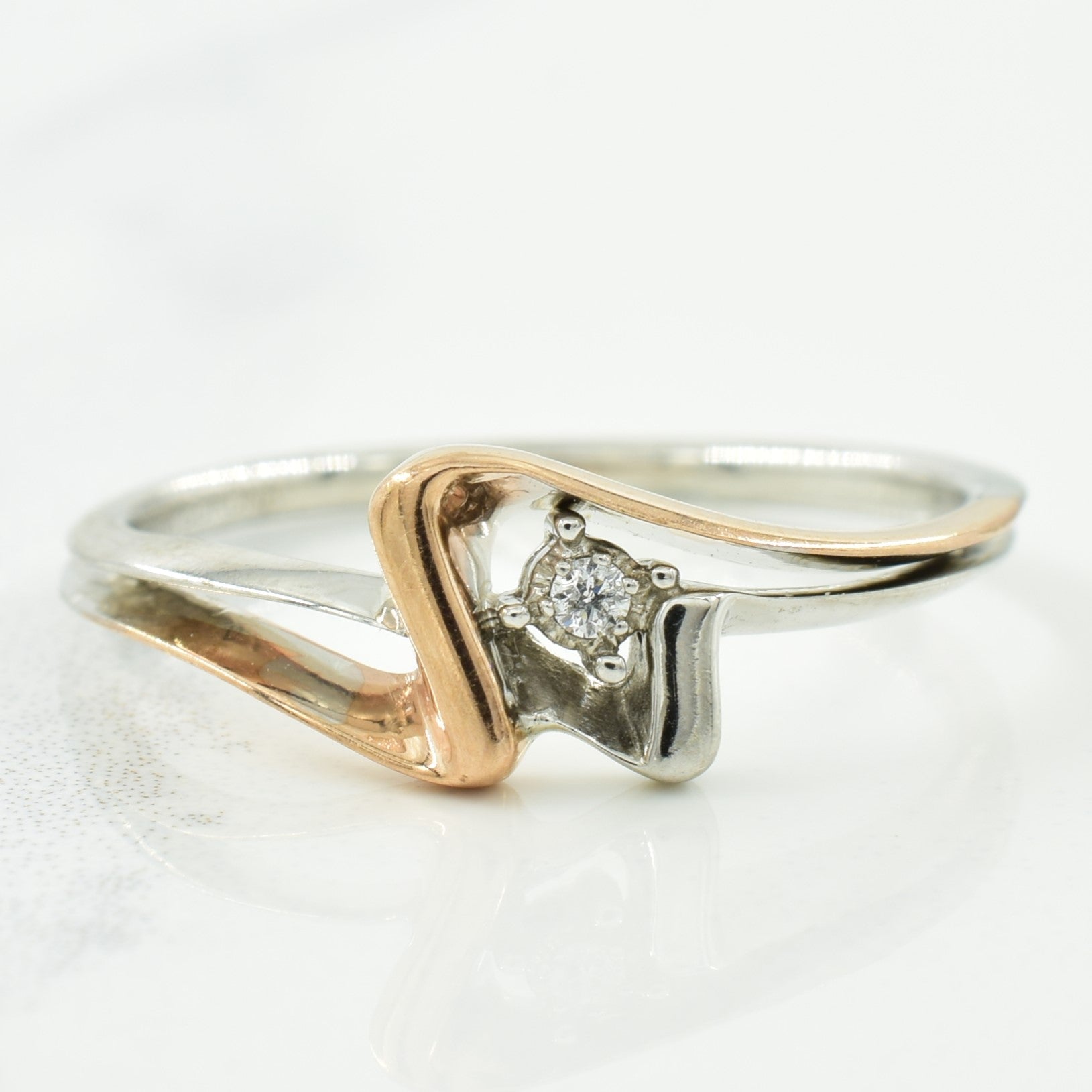 Bague en or bicolore et diamant | 0,02 ct | Taille 7 |