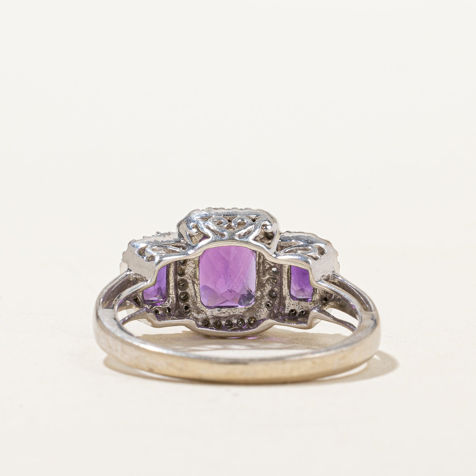 Three Stone Amethyst & Diamond Halo Ring | 1.70ctw, 0.08ctw | SZ 7 |