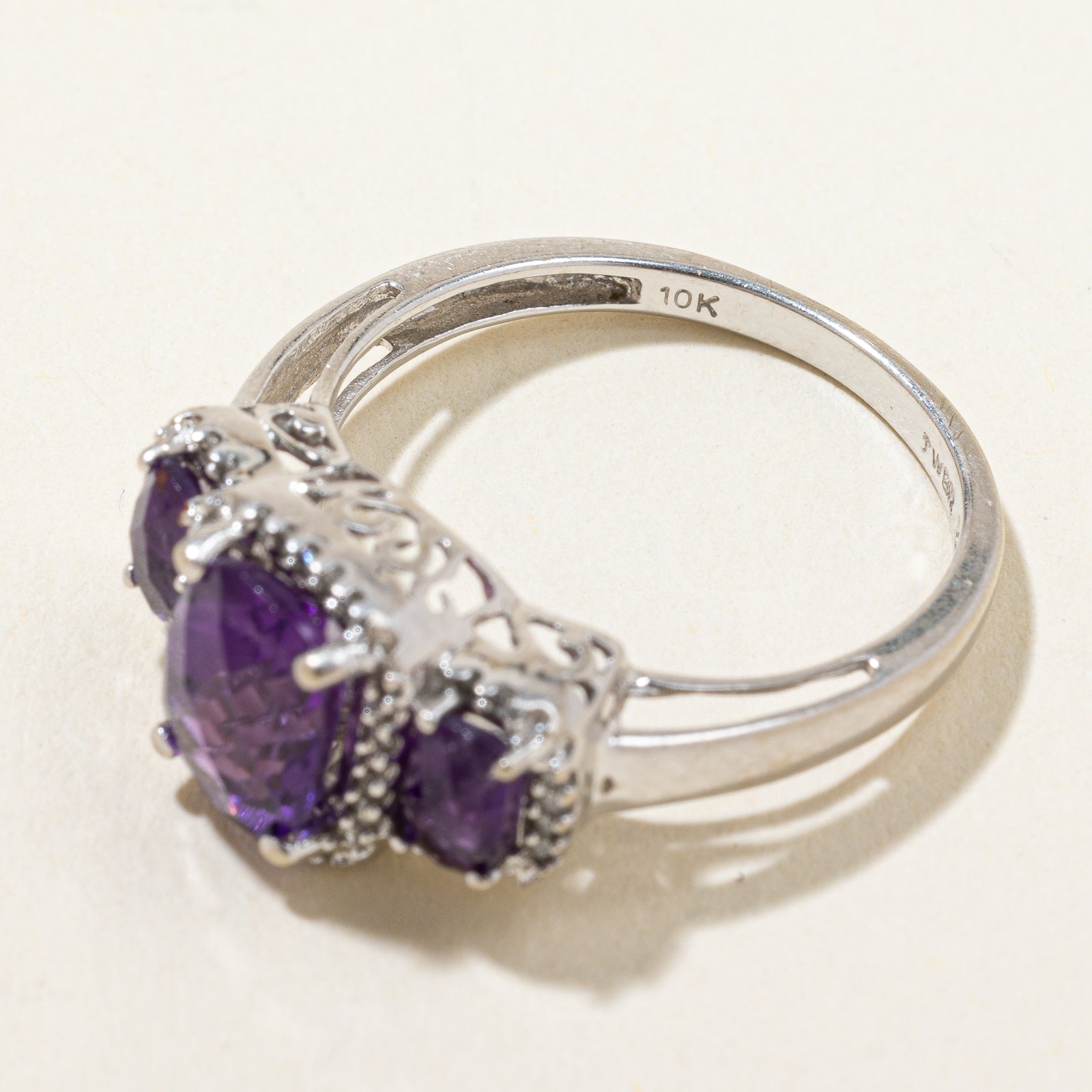 Three Stone Amethyst & Diamond Halo Ring | 1.70ctw, 0.08ctw | SZ 7 |