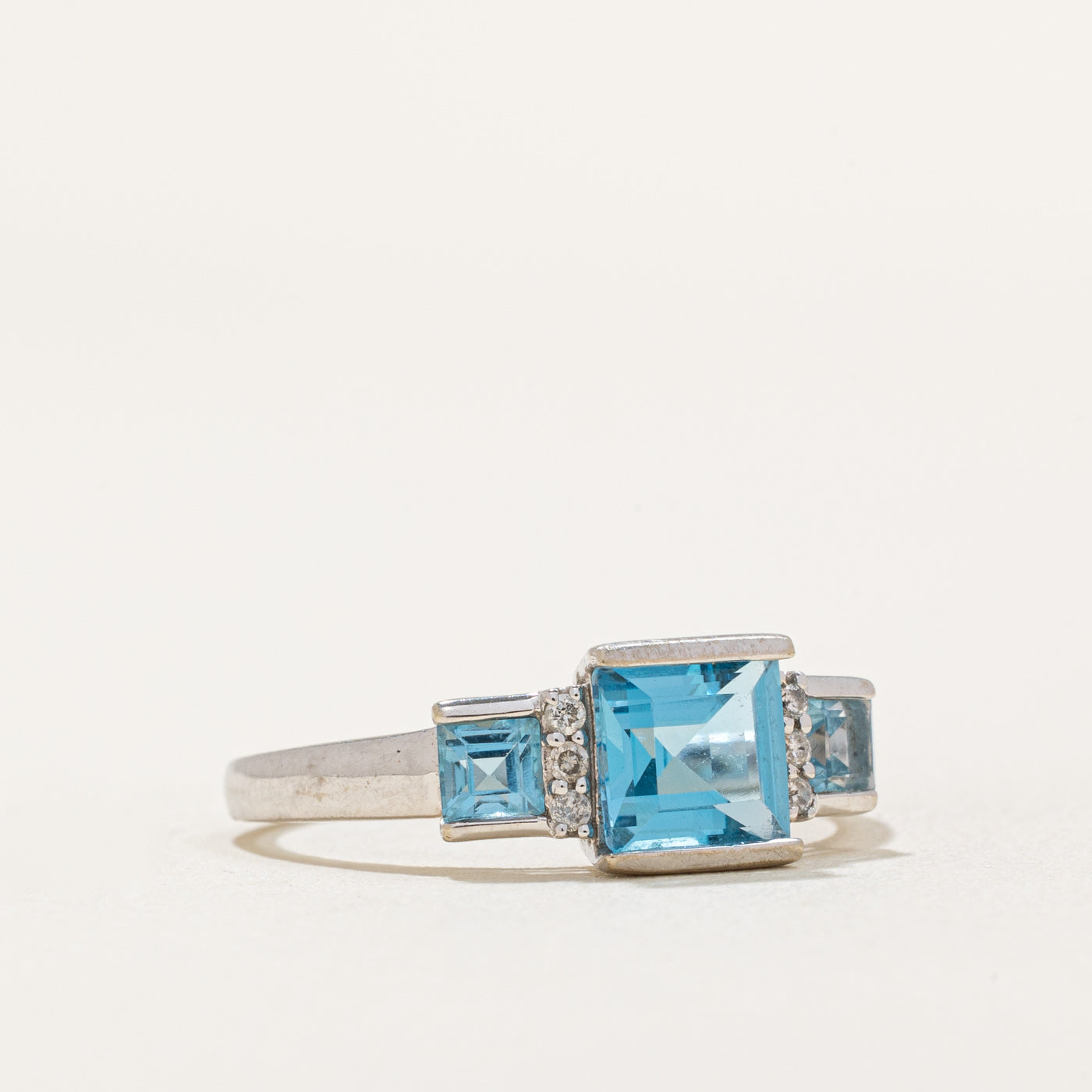 Three Stone Princess Cut Topaz & Diamond Ring | 1.50ctw, 0.05ctw | SZ 7.25 |