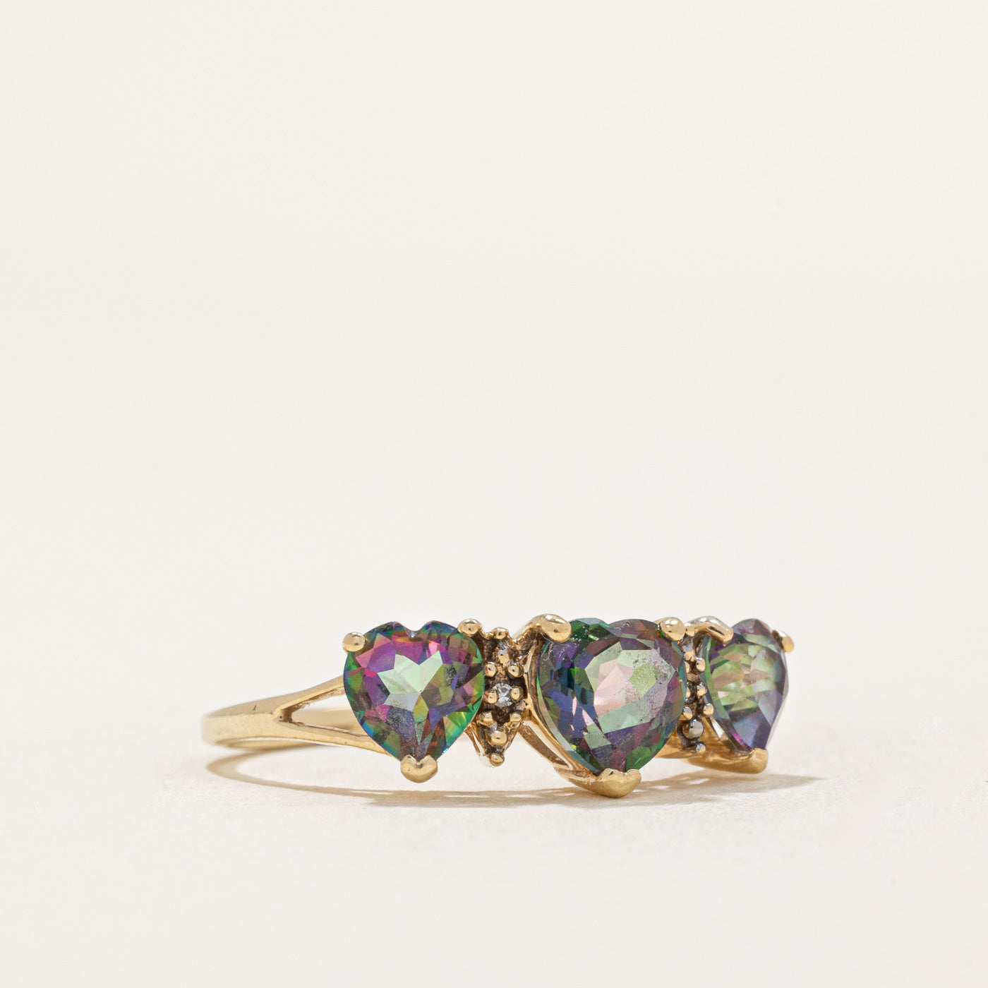 Three Stone Heart Cut Mystic Topaz & Diamond Ring | 1.50ctw, 0.005ctw | SZ 7 |