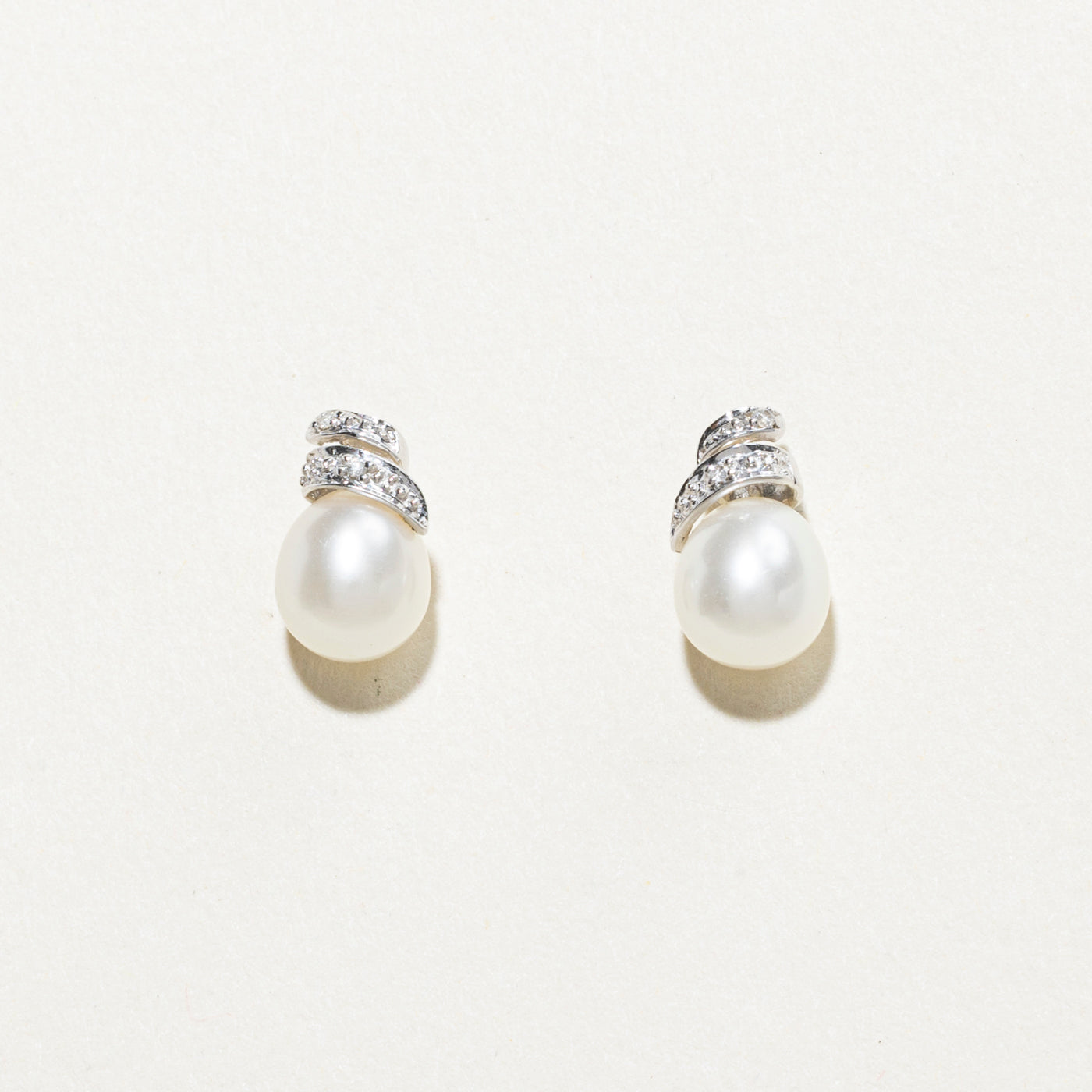 14K Pearl & Diamond Swirl Stud Earrings | 0.02ct