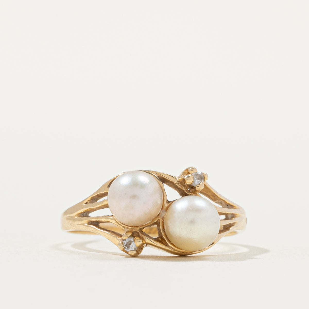 14k Toi et Moi Pearl & Diamond Accented Openwork Bypass Ring | 0.02ctw | SZ 7.25