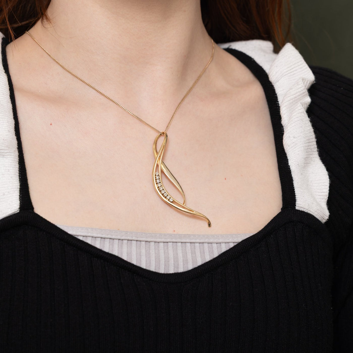 14k Diamond Accented Wave Cross Over Pendant | 0.38ctw