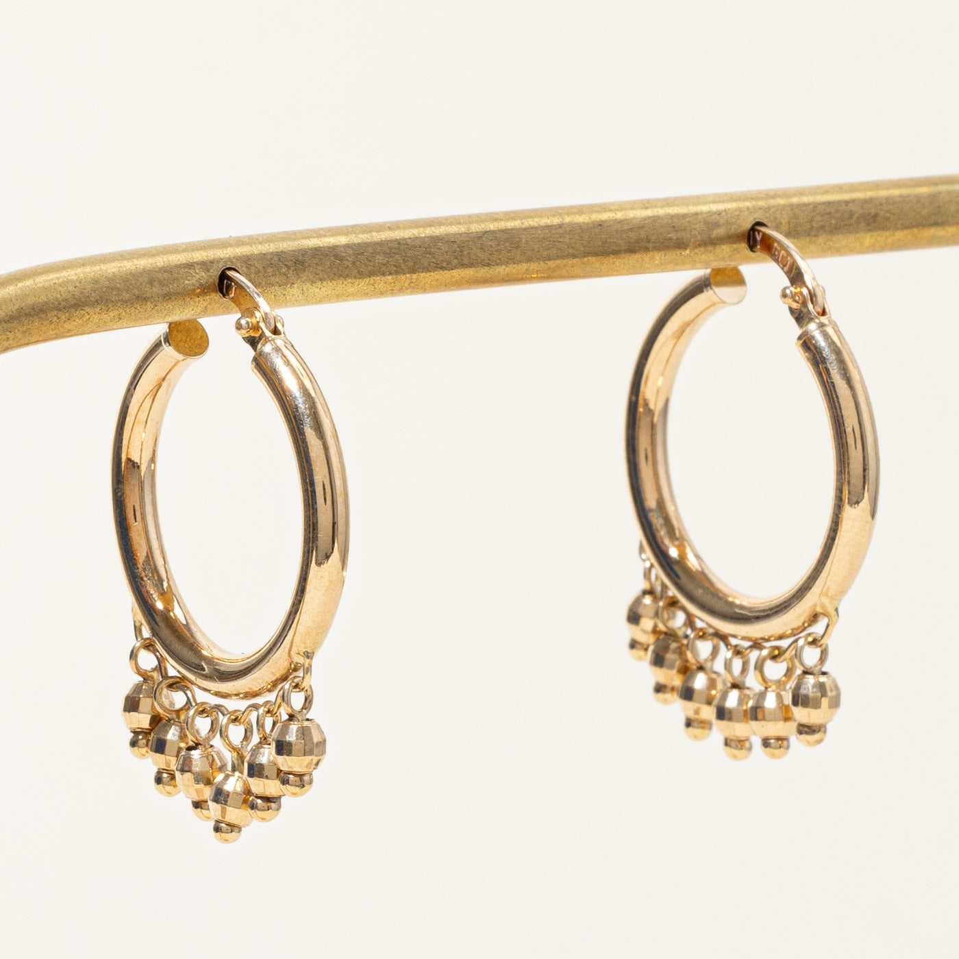 Boucles d'oreilles créoles pendantes en or jaune 14 carats