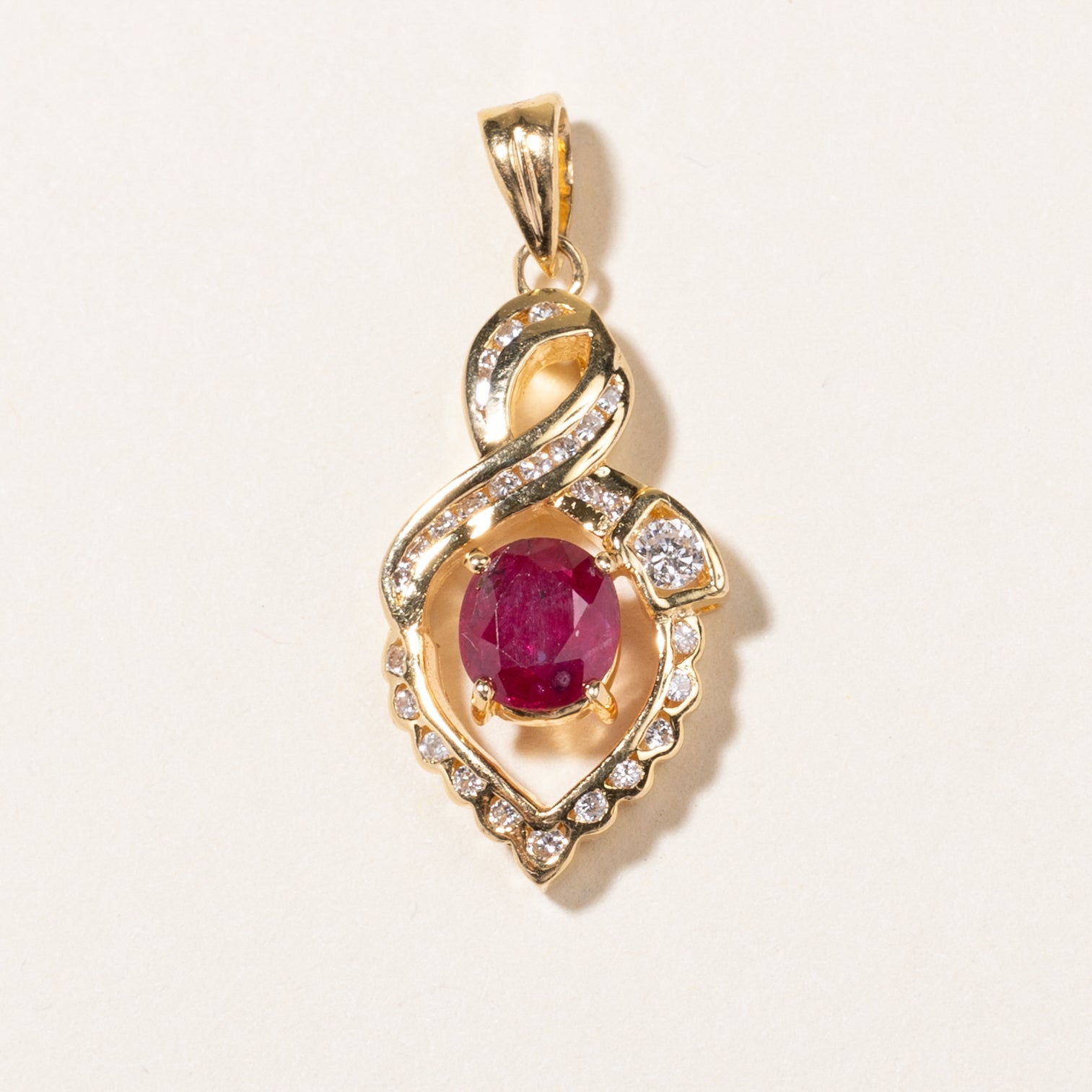 14K Oval Cut Ruby & Diamond Ornate Pendant | 0.65ct, 0.17ctw