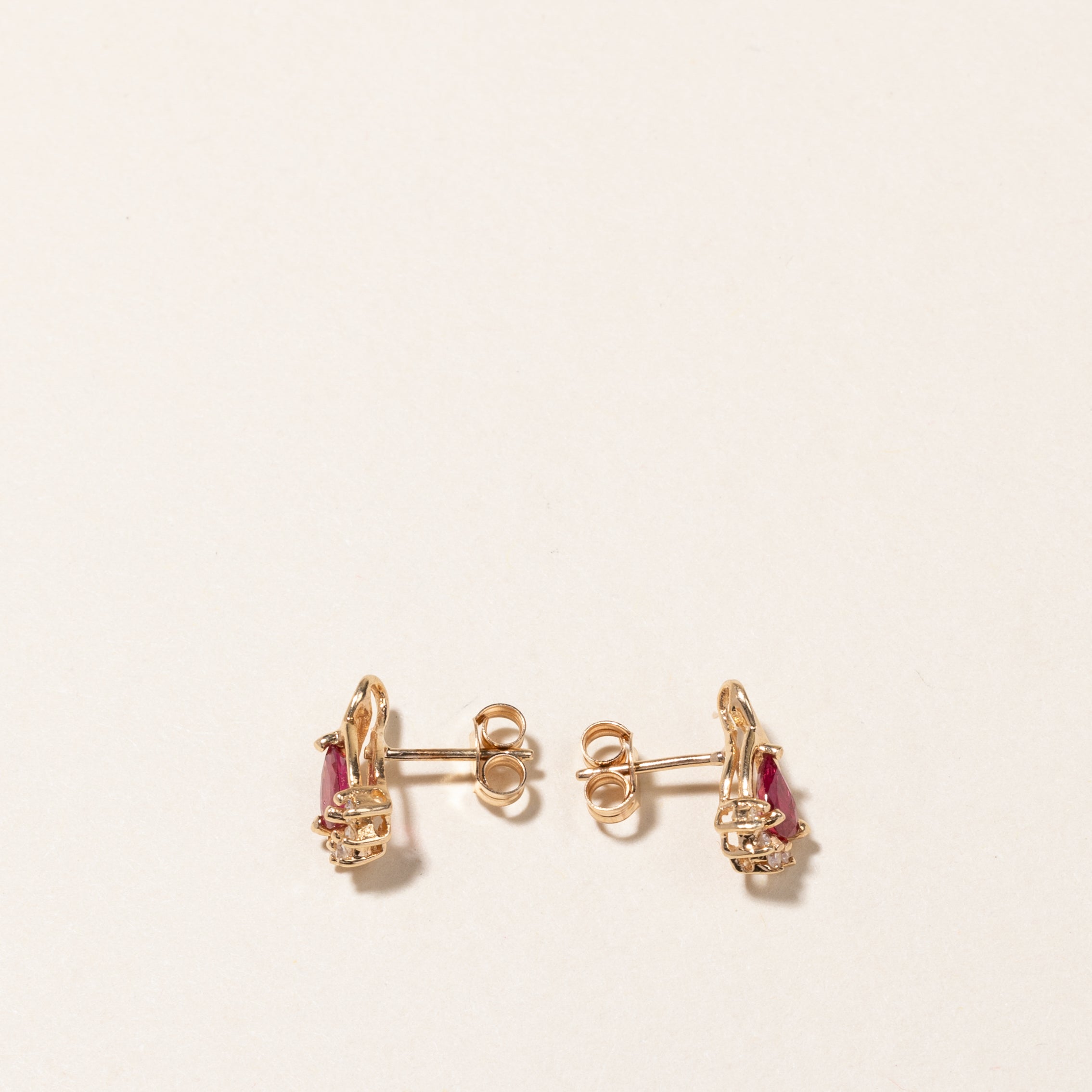 14K Pear Cut Synthetic Ruby & Diamond Stud Earrings | 0.40ctw, 0.04ctw