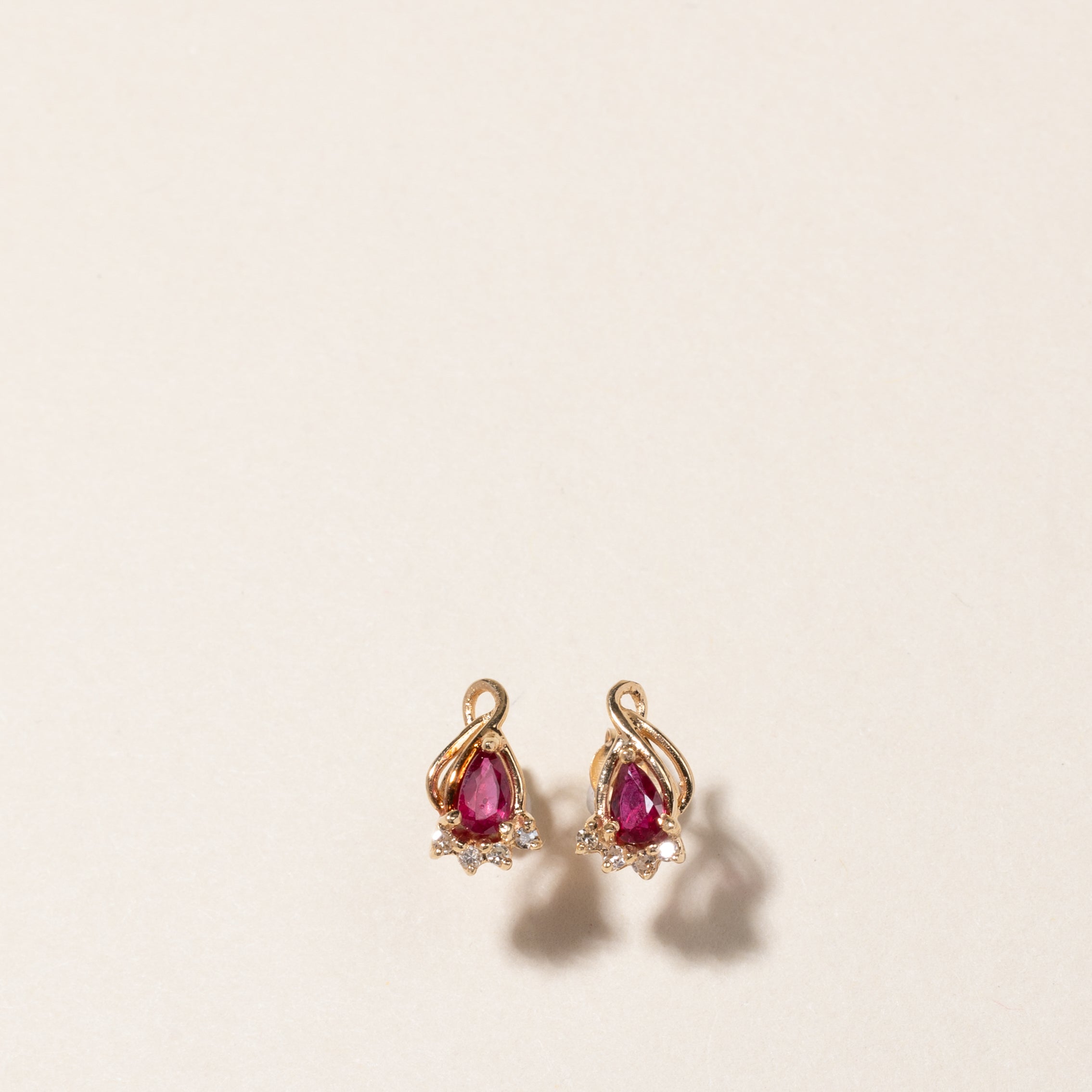 14K Pear Cut Synthetic Ruby & Diamond Stud Earrings | 0.40ctw, 0.04ctw