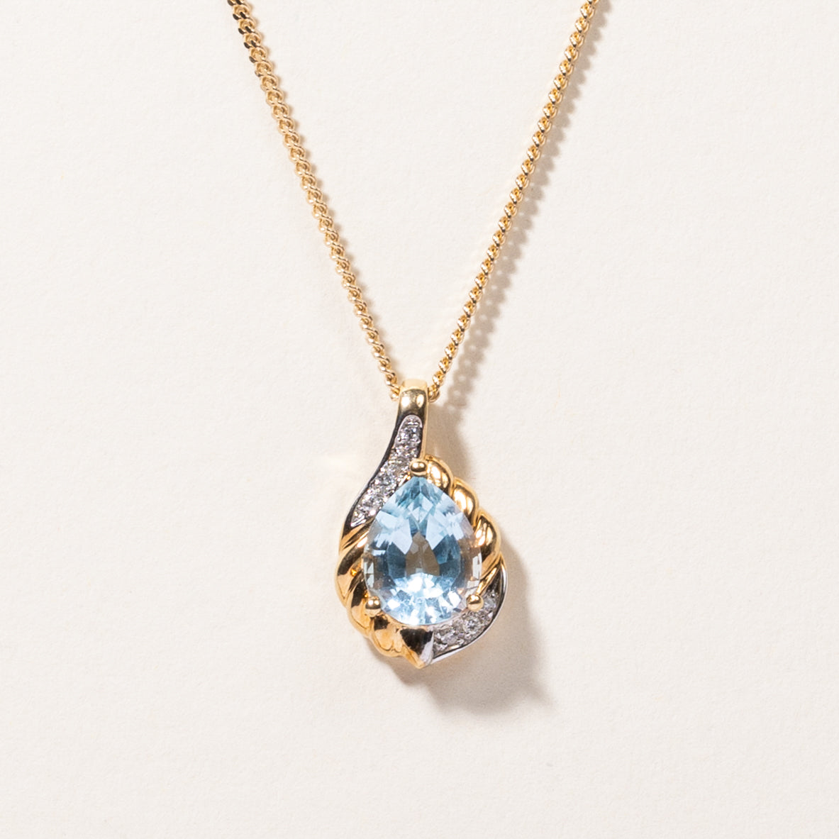 10K Yellow Gold Blue Topaz & Diamond Pendant Necklace | 3.21ct, 0.07ctw | 20"