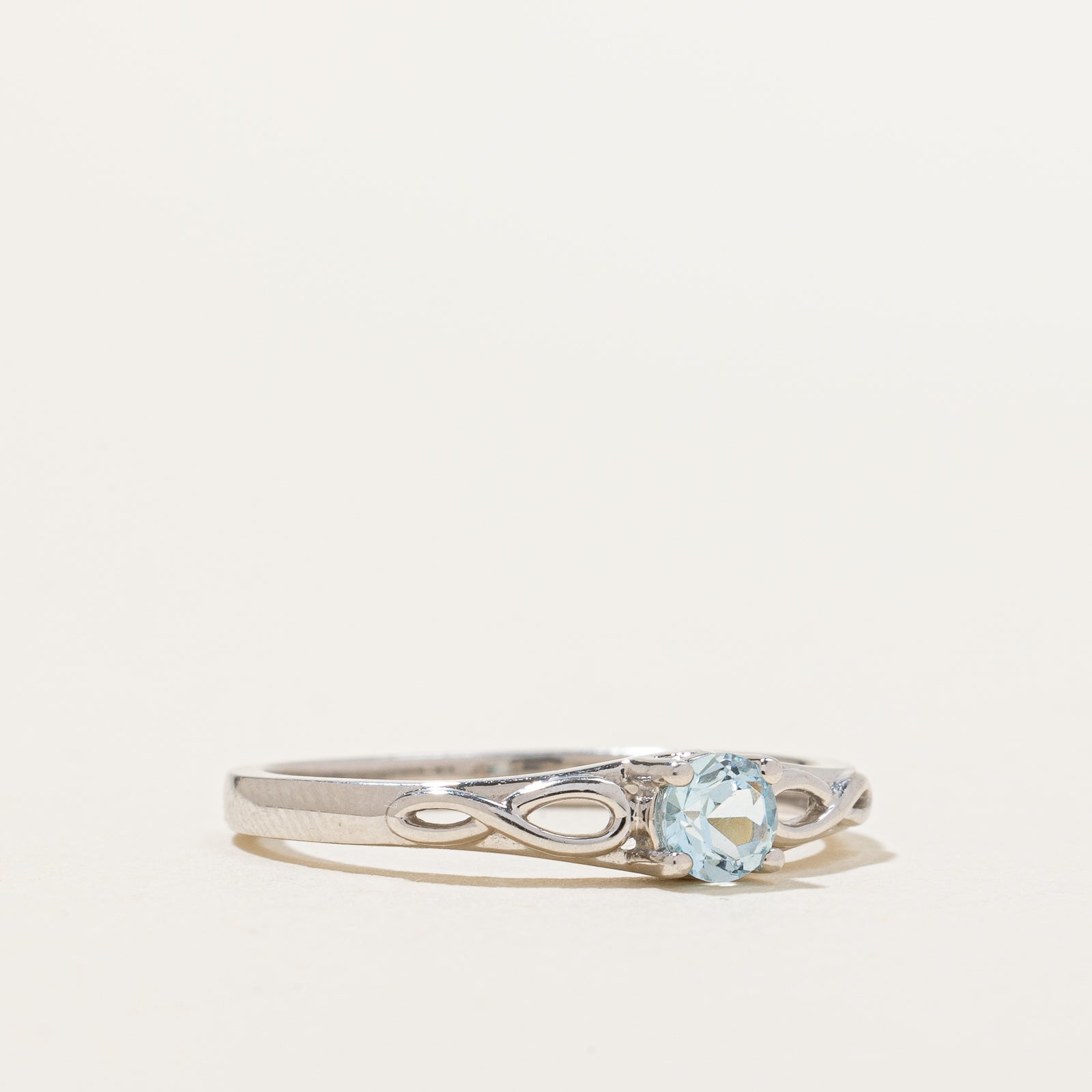 Blue Topaz Twisted Ring | 0.30ct | SZ 6.75 |