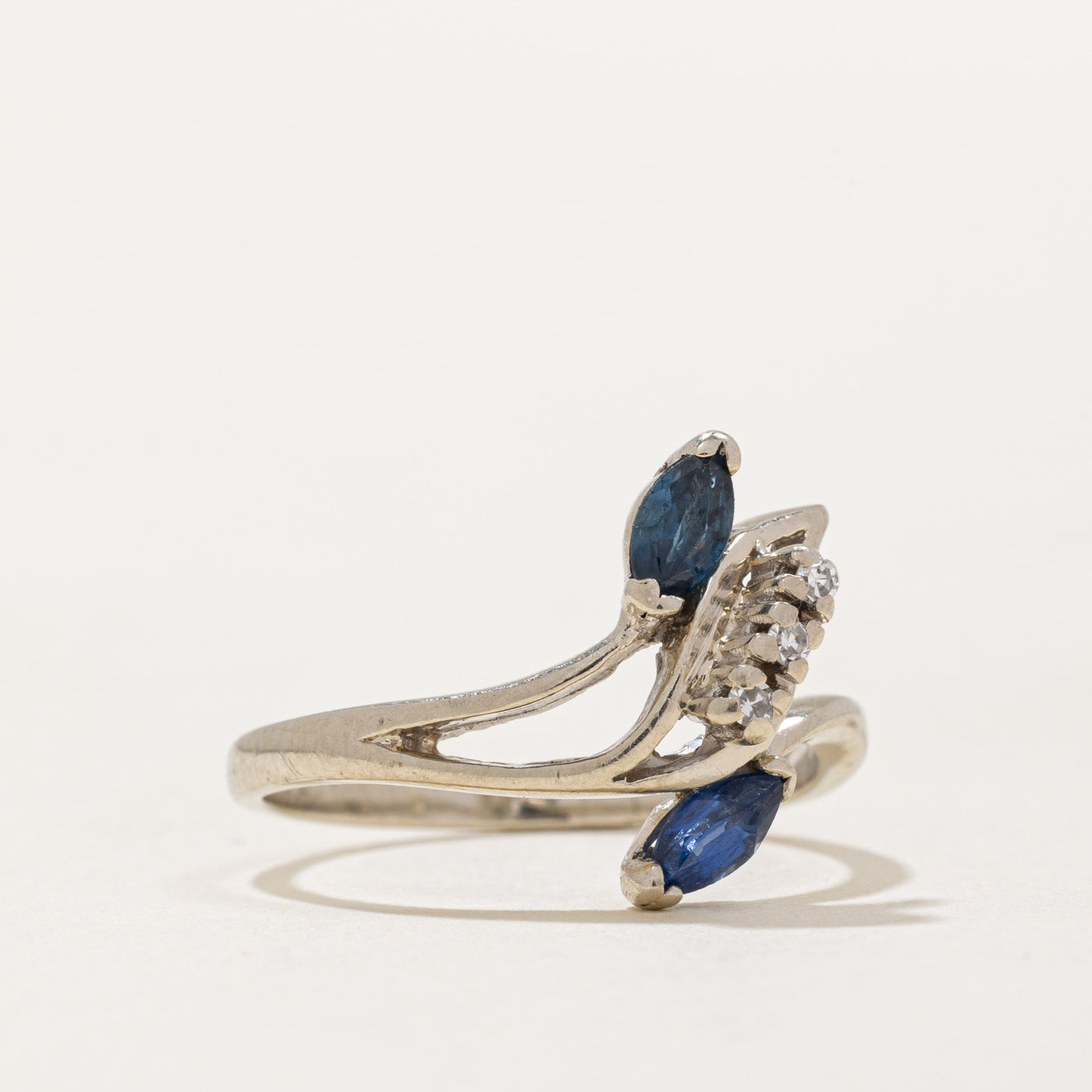 Sapphire & Diamond Bypass Ring | 0.25ctw, 0.05ctw | SZ 6.25 |