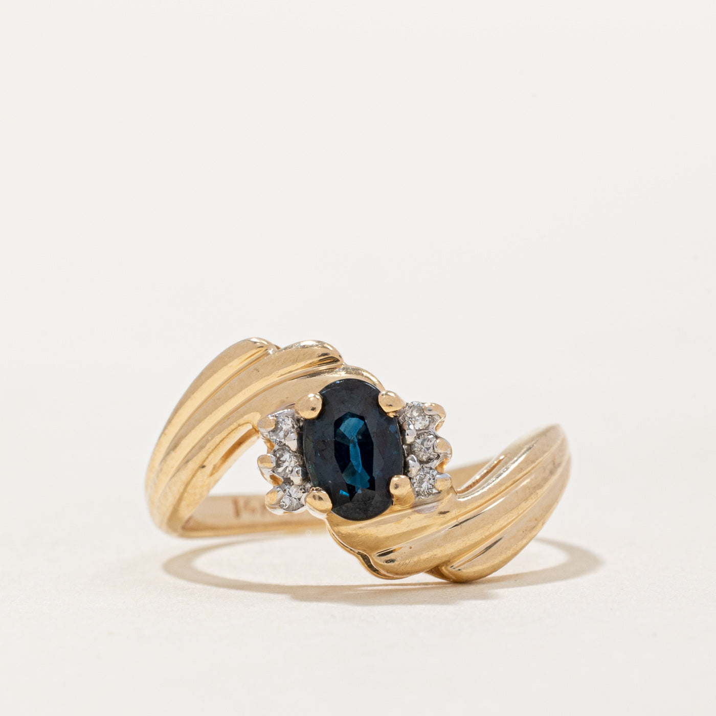 Sapphire & Diamond Bypass Ring | 0.55ct, 0.06ctw | SZ 5.25 |