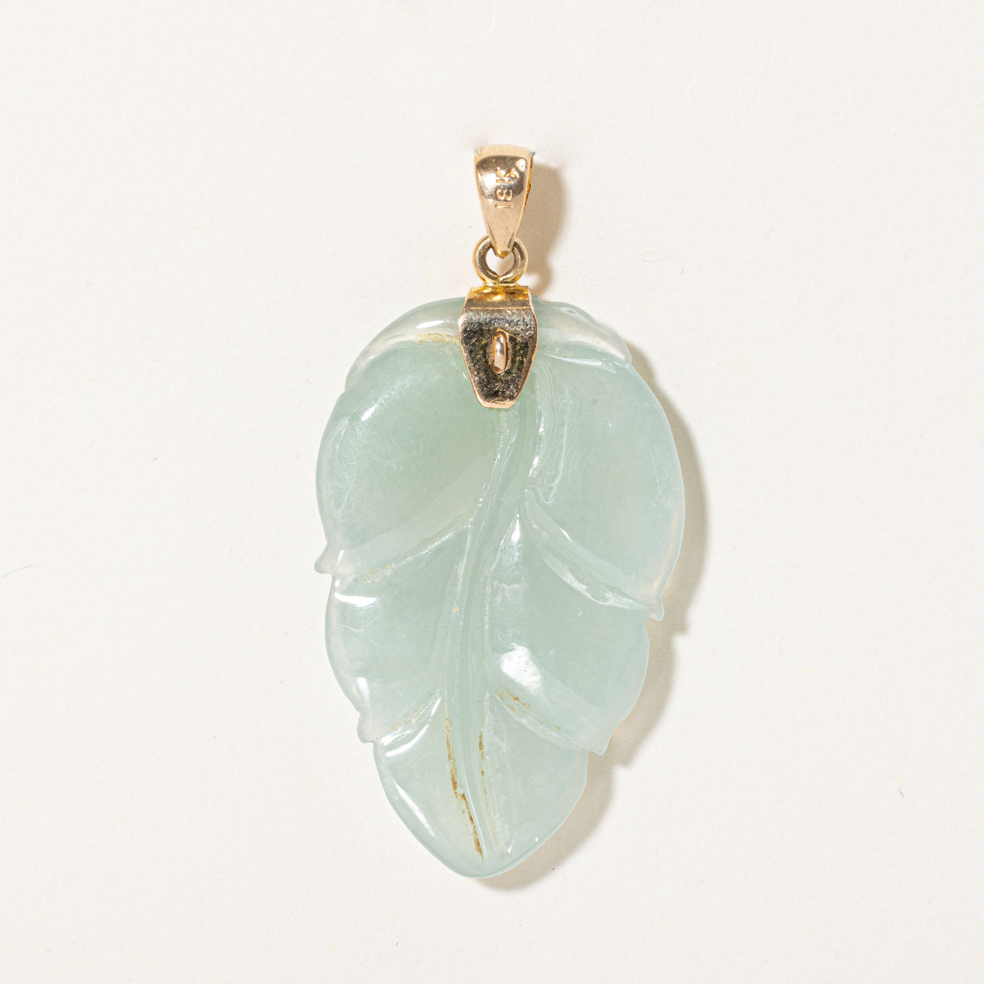 Carved Jadeite Pendant | 35.00ct |