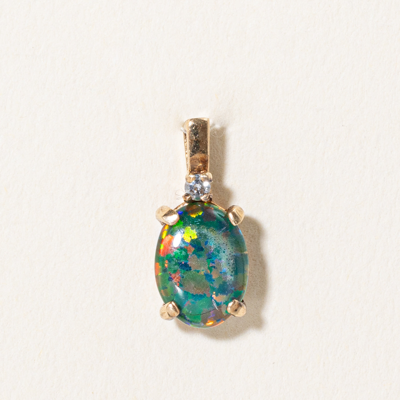Synthetic Opal Triplet & Diamond Pendant | 0.85ct, 0.02ct |