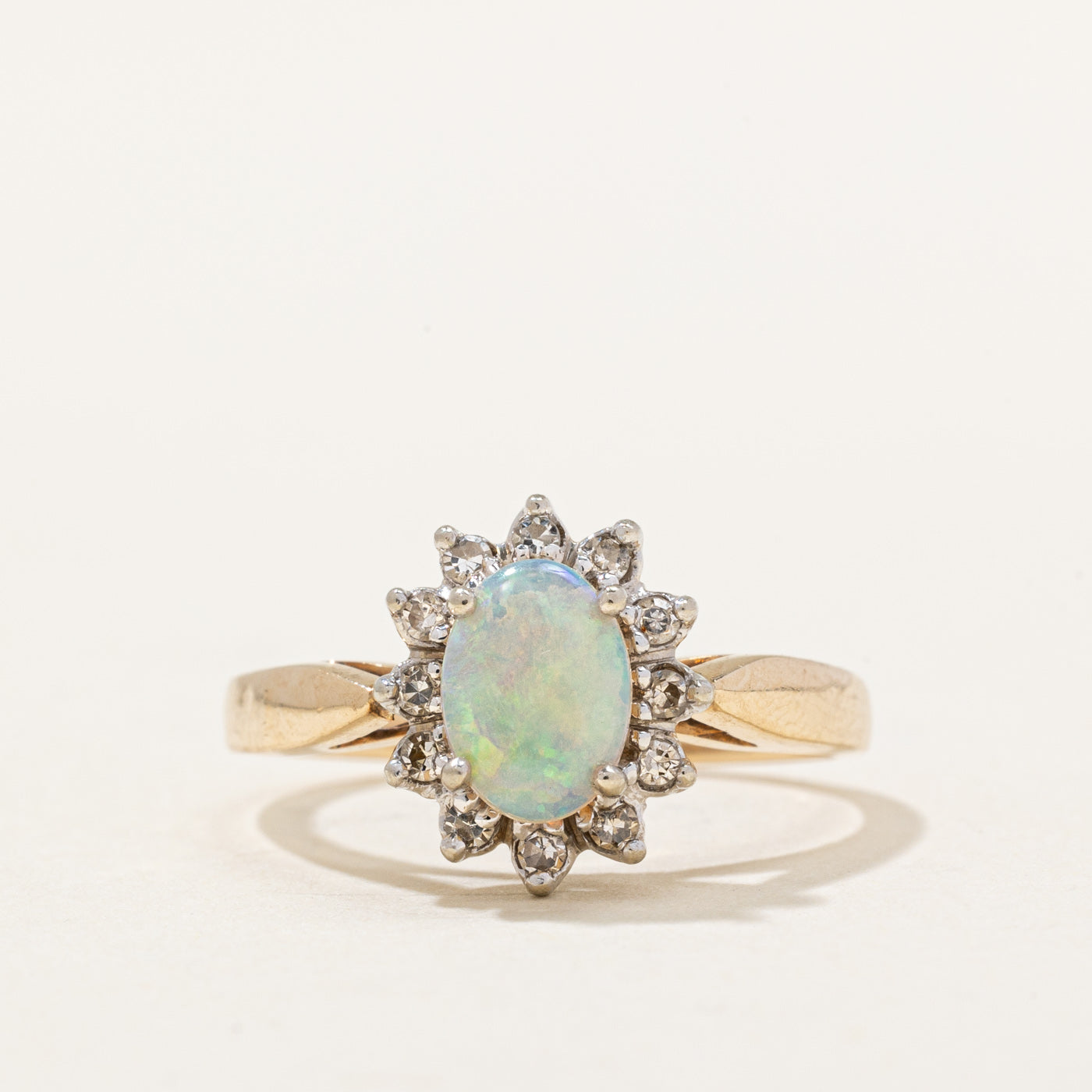 Opal & Diamond Halo Ring | 0.40ct, 0.06ctw | SZ 5 |