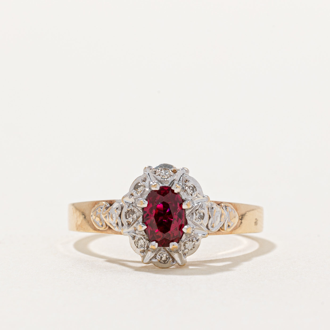 Synthetic Ruby & Diamond Halo Ring | 0.45ct, 0.04ctw | SZ 7.75 |