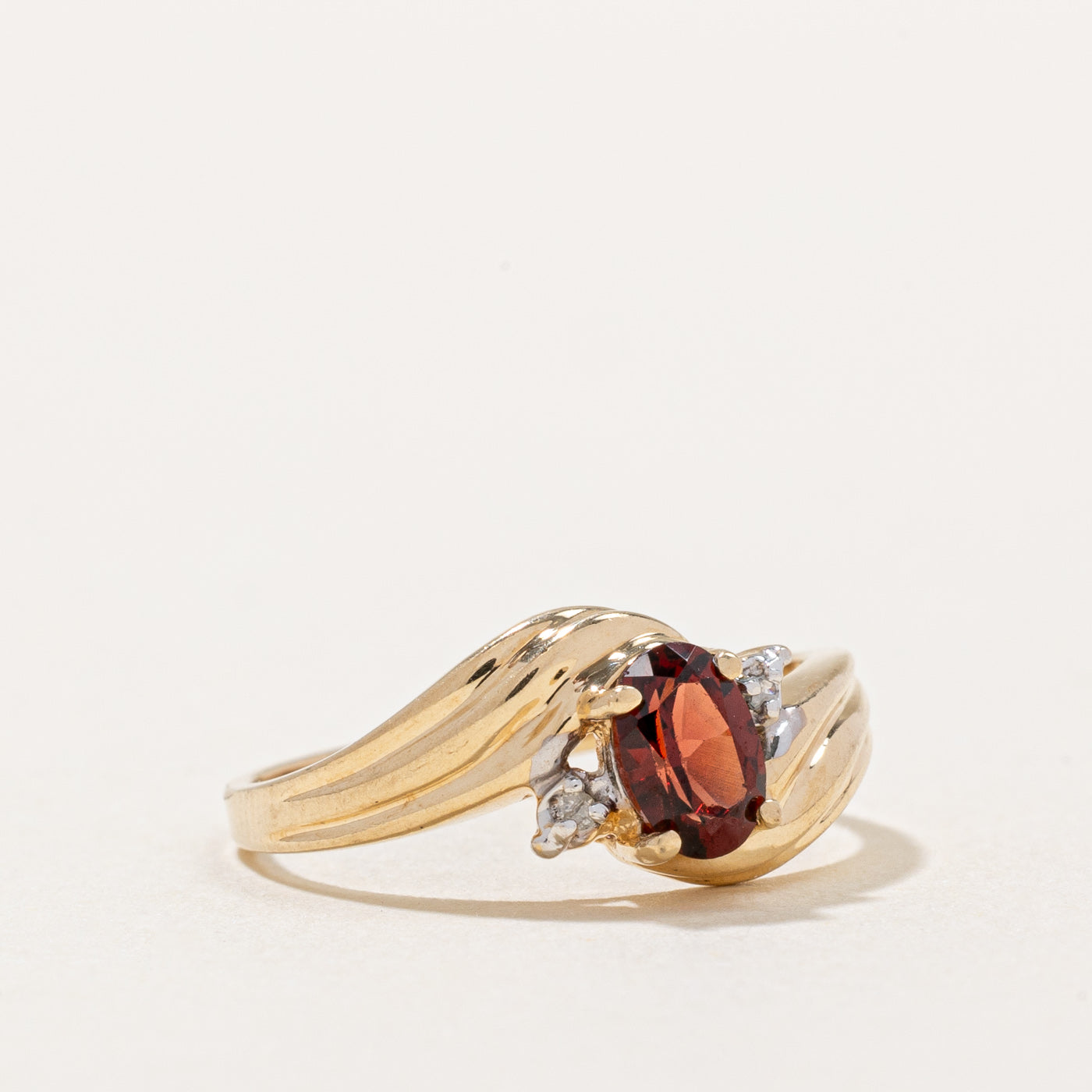 Garnet & Diamond Bypass Ring | 0.60ct, 0.01ctw | SZ 5.75 |