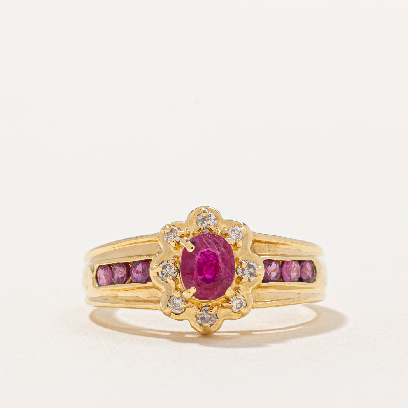 Ruby & Diamond Halo Ring | 0.60ctw, 0.08ctw | SZ 6 |