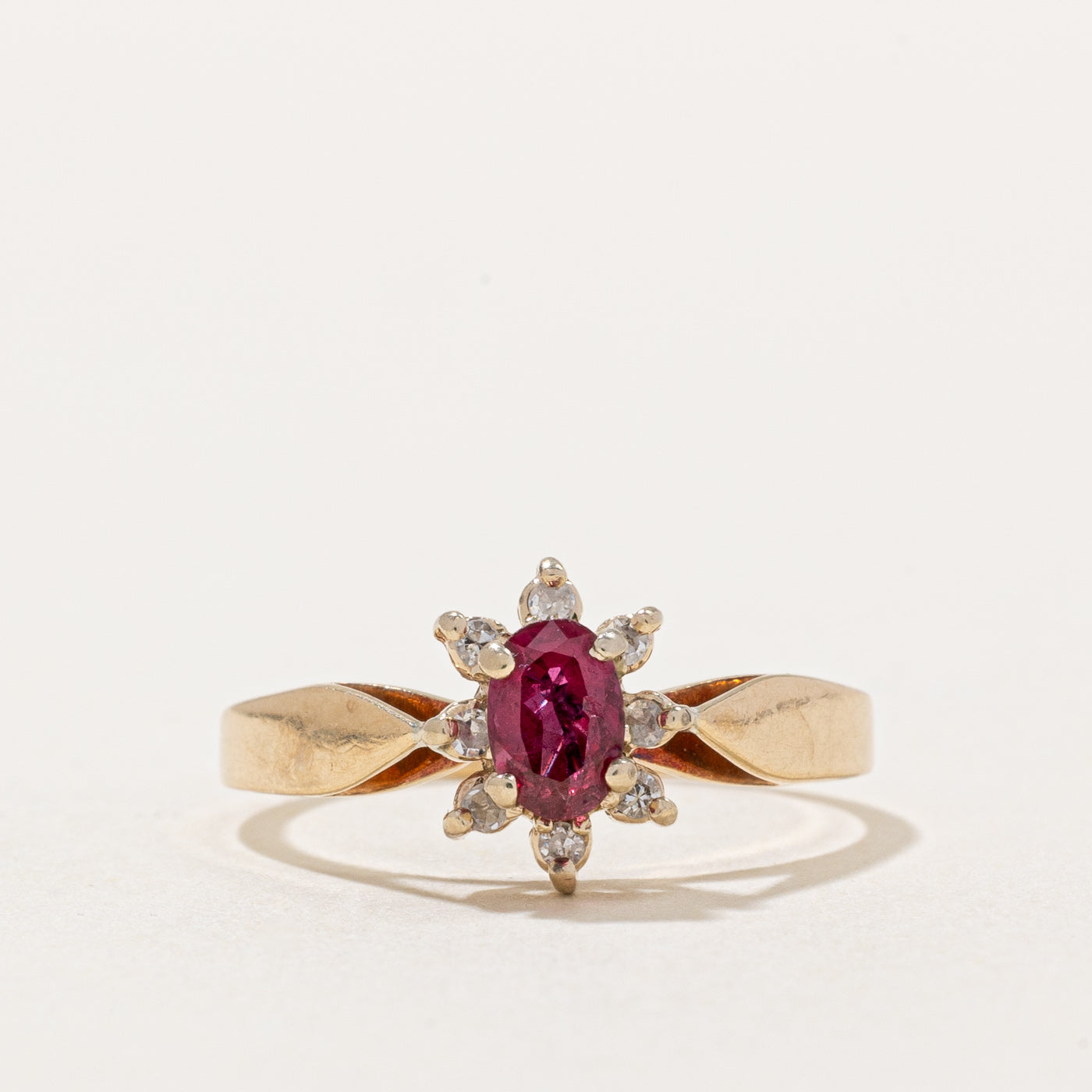 Ruby & Diamond Halo Ring | 0.54ct, 0.08ctw | SZ 6 |