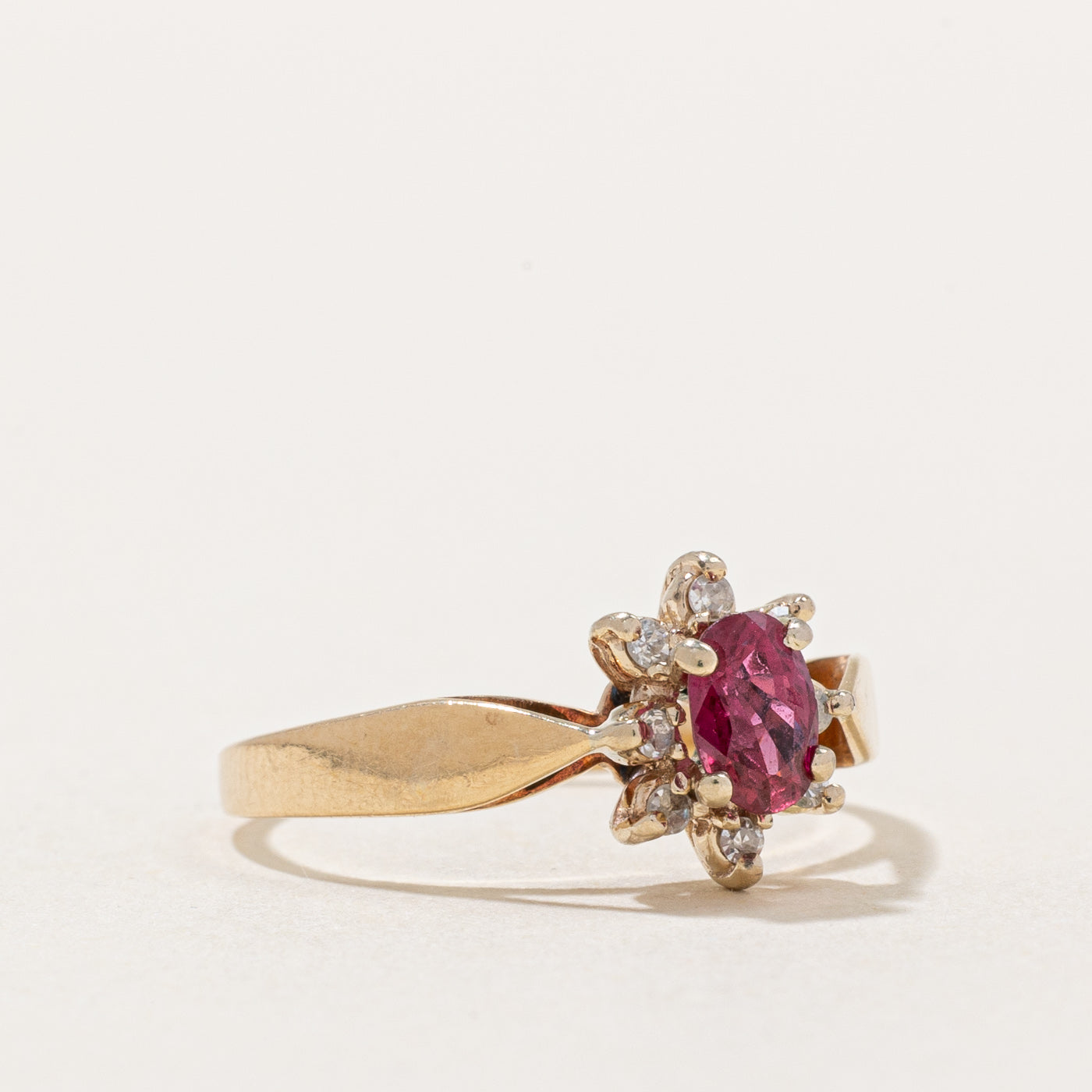 Ruby & Diamond Halo Ring | 0.54ct, 0.08ctw | SZ 6 |