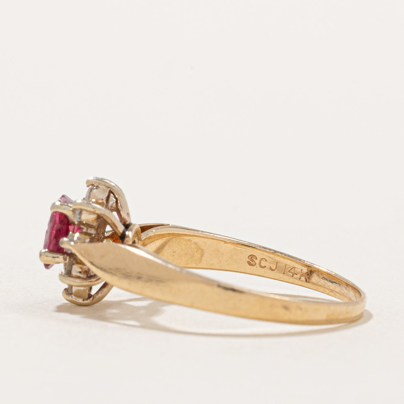 Ruby & Diamond Halo Ring | 0.54ct, 0.08ctw | SZ 6 |