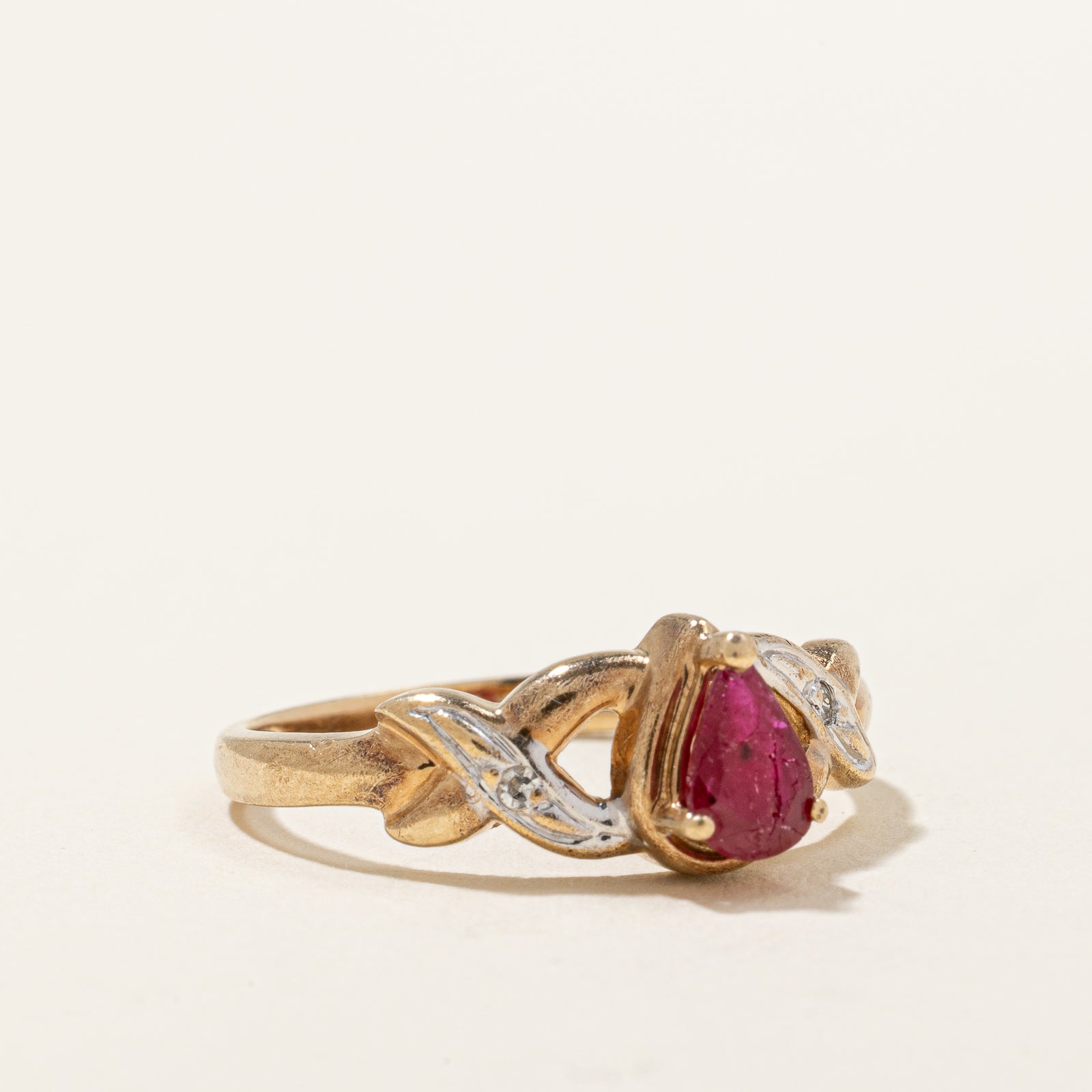 Pear Cut Ruby & Diamond Crossover Ring | 0.40ct, 0.02ctw | SZ 6.75 |