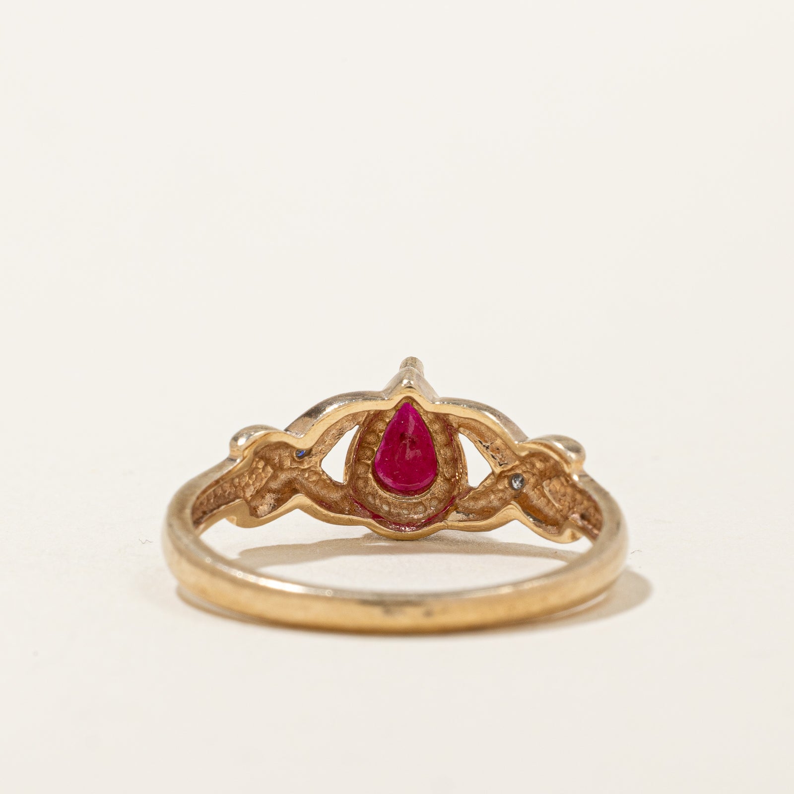 Pear Cut Ruby & Diamond Crossover Ring | 0.40ct, 0.02ctw | SZ 6.75 |