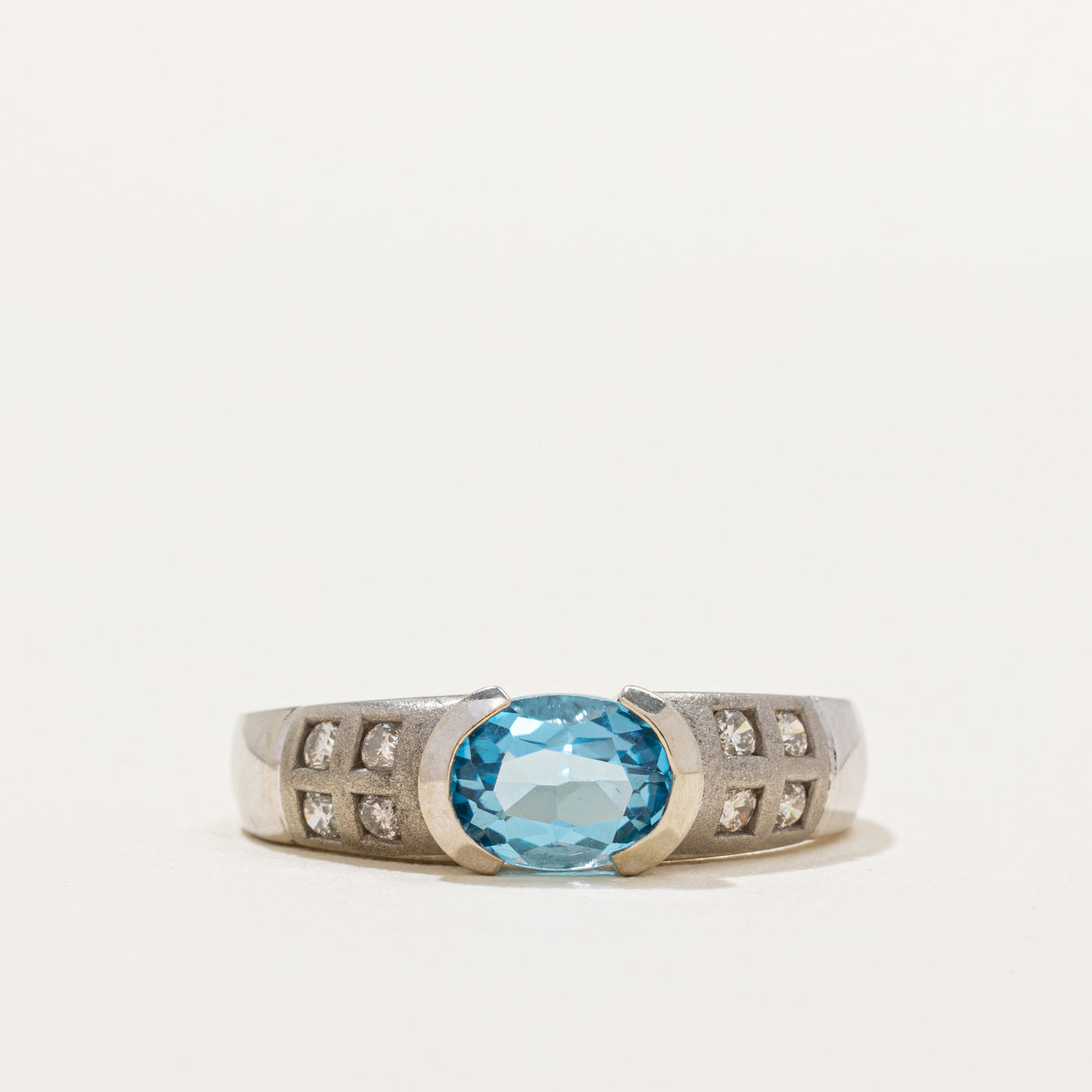 Semi Bezel East West Blue Topaz & Diamond Ring | 1.20ct, 0.16ctw | SZ 6.25 |