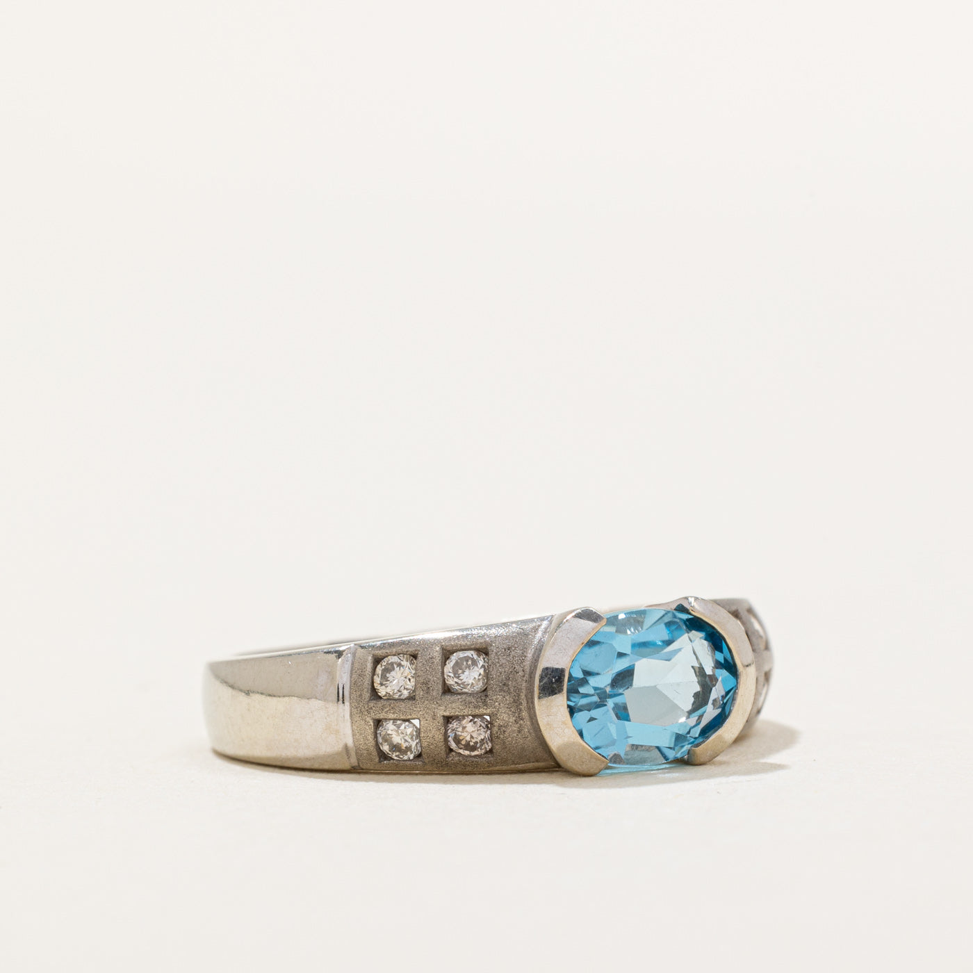 Semi Bezel East West Blue Topaz & Diamond Ring | 1.20ct, 0.16ctw | SZ 6.25 |