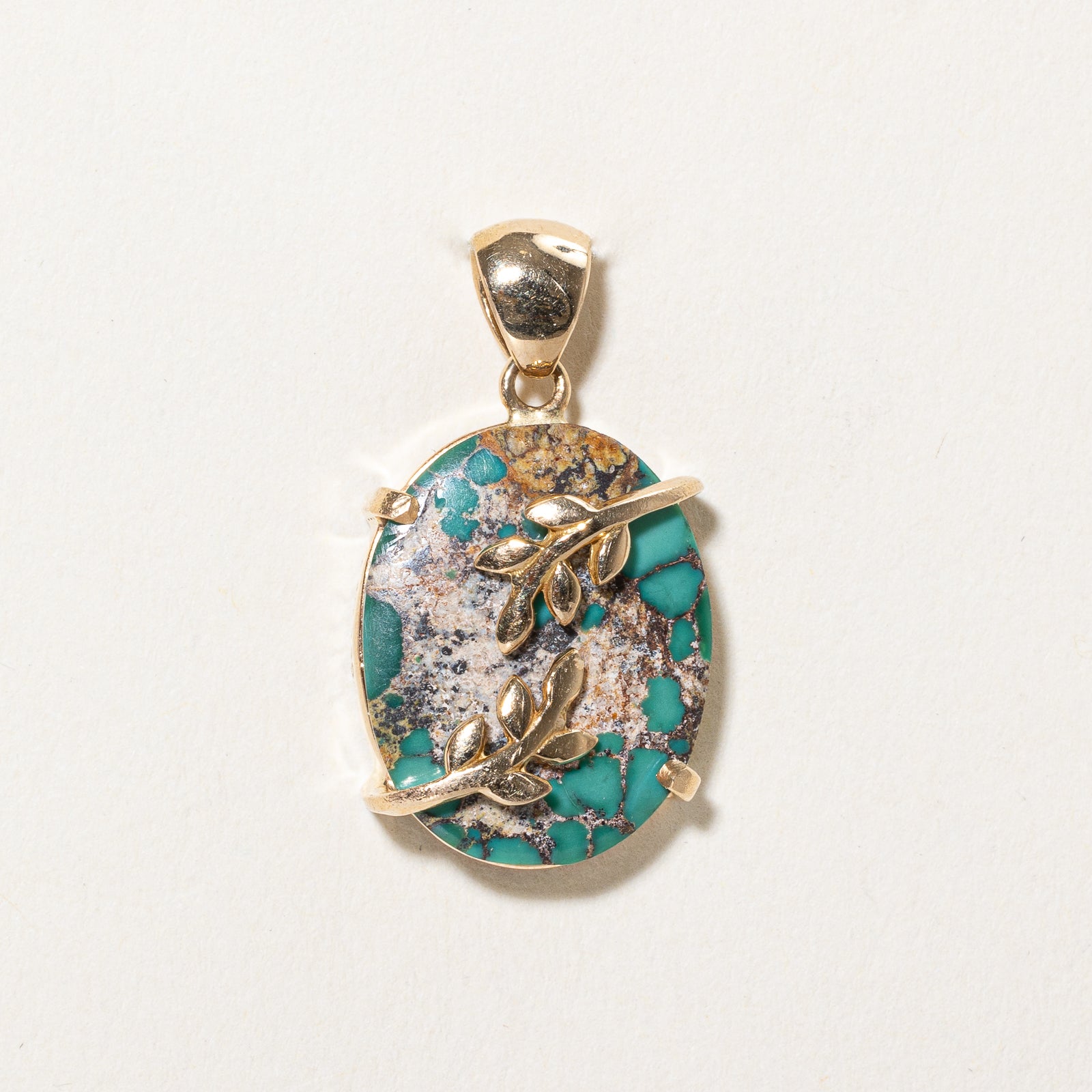 Oval Turquoise Leaf Design Pendant | 12.00ct