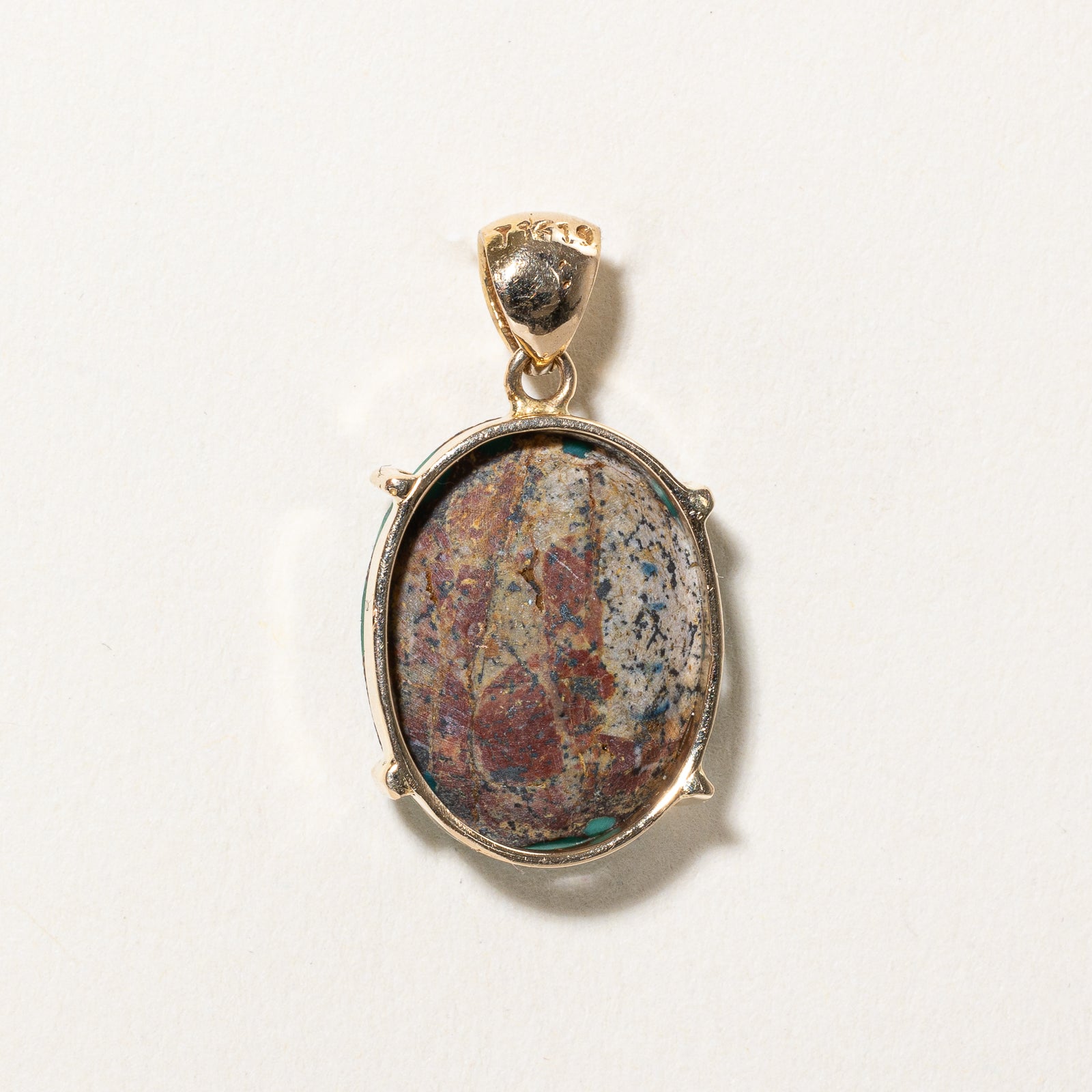 Oval Turquoise Leaf Design Pendant | 12.00ct