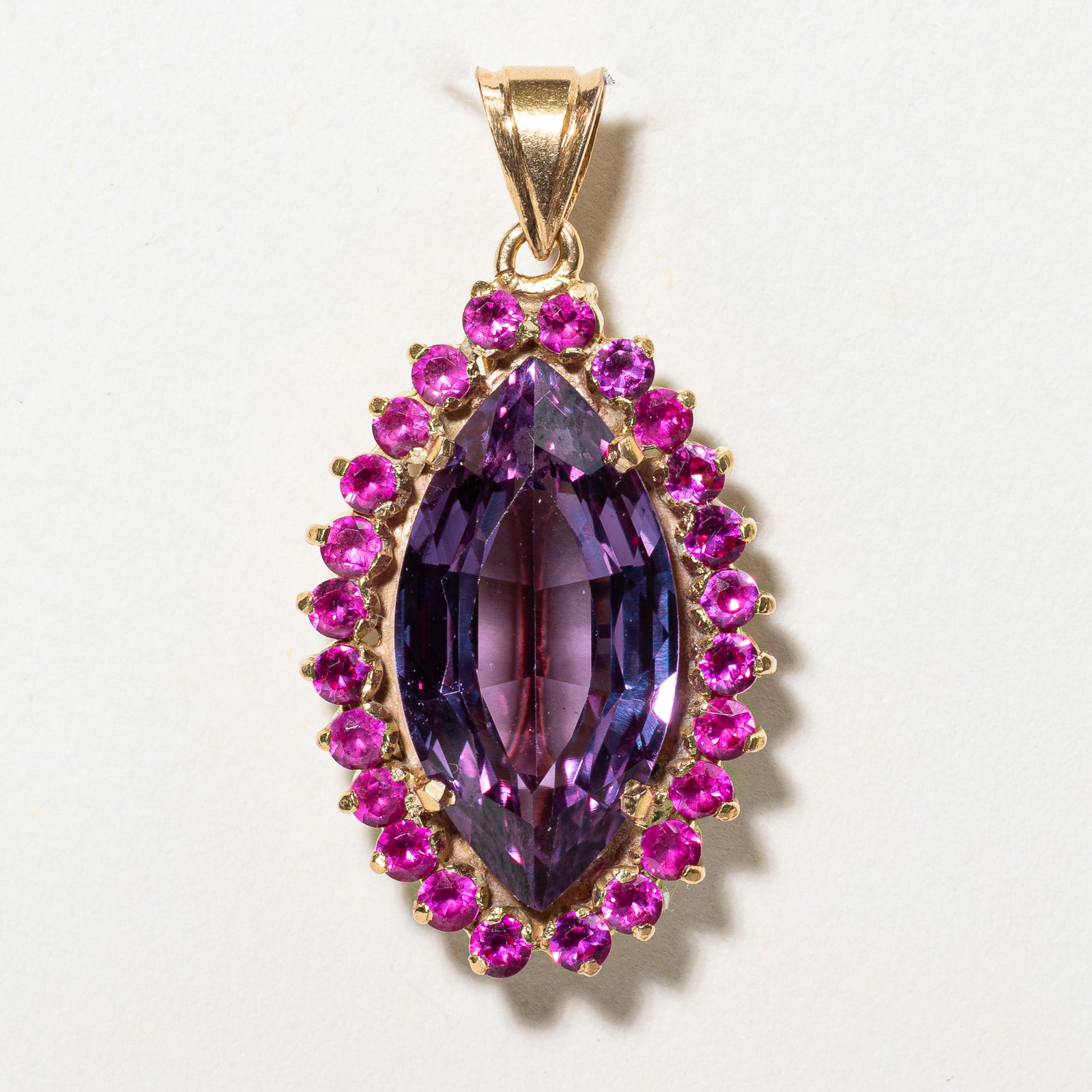 Colour Change Synthetic Purple Sapphire & Synthetic Ruby Halo Pendant | 7.50ct, 0.48ctw |