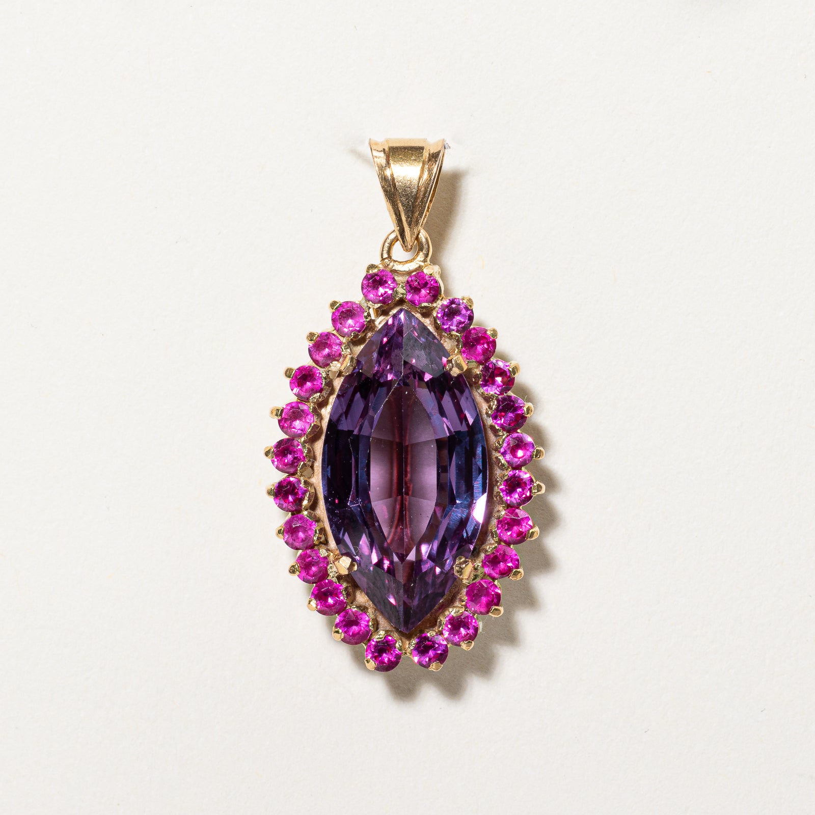 Colour Change Synthetic Purple Sapphire & Synthetic Ruby Halo Pendant | 7.50ct, 0.48ctw |