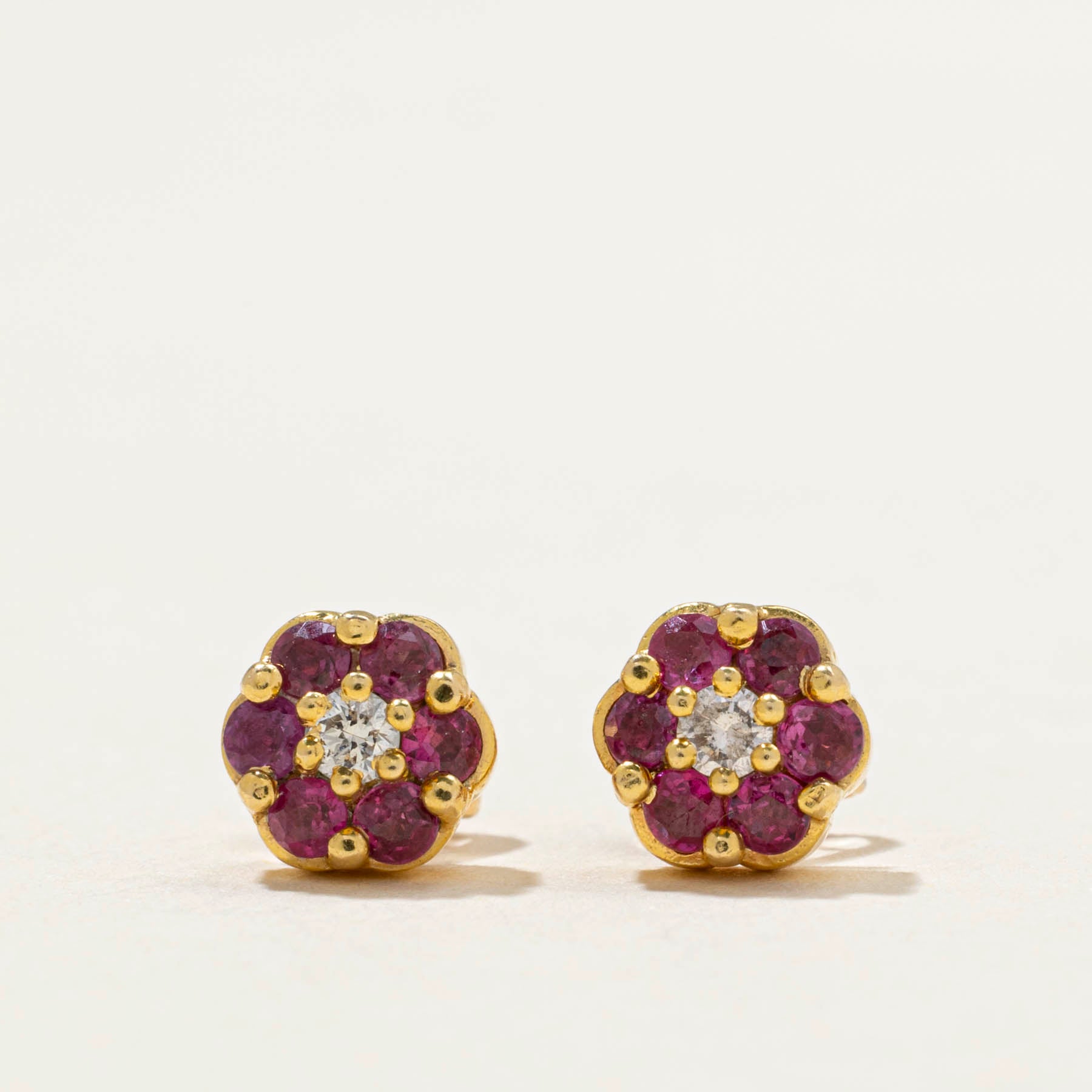 Ruby & Diamond Flower Stud Earrings | 0.30ctw | 0.06ctw |