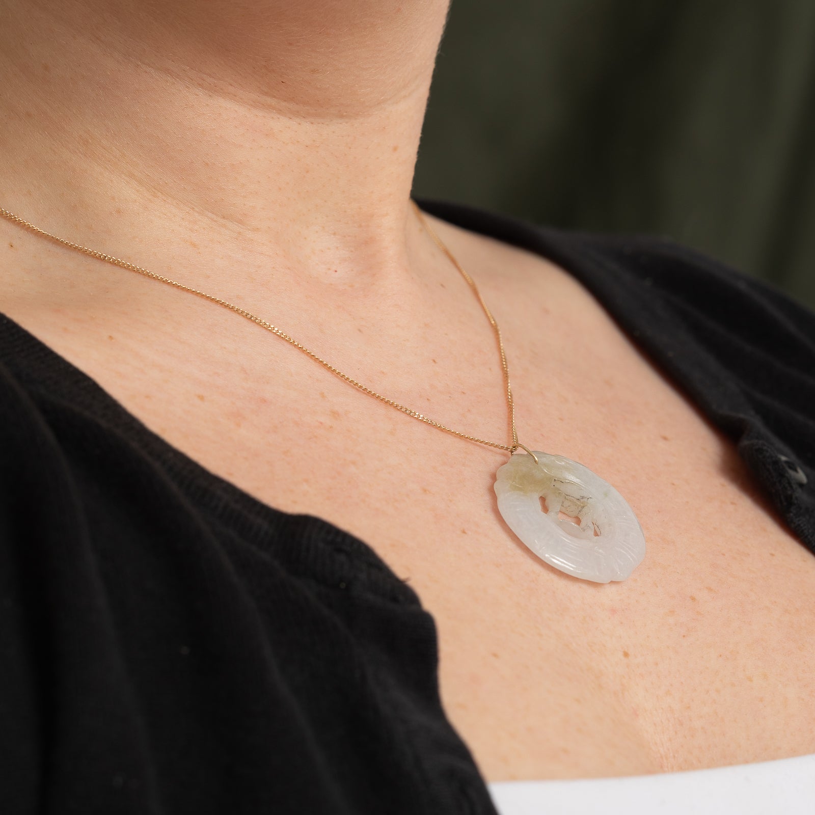 Carved Circular Jadeite Pendant | 43.00ct