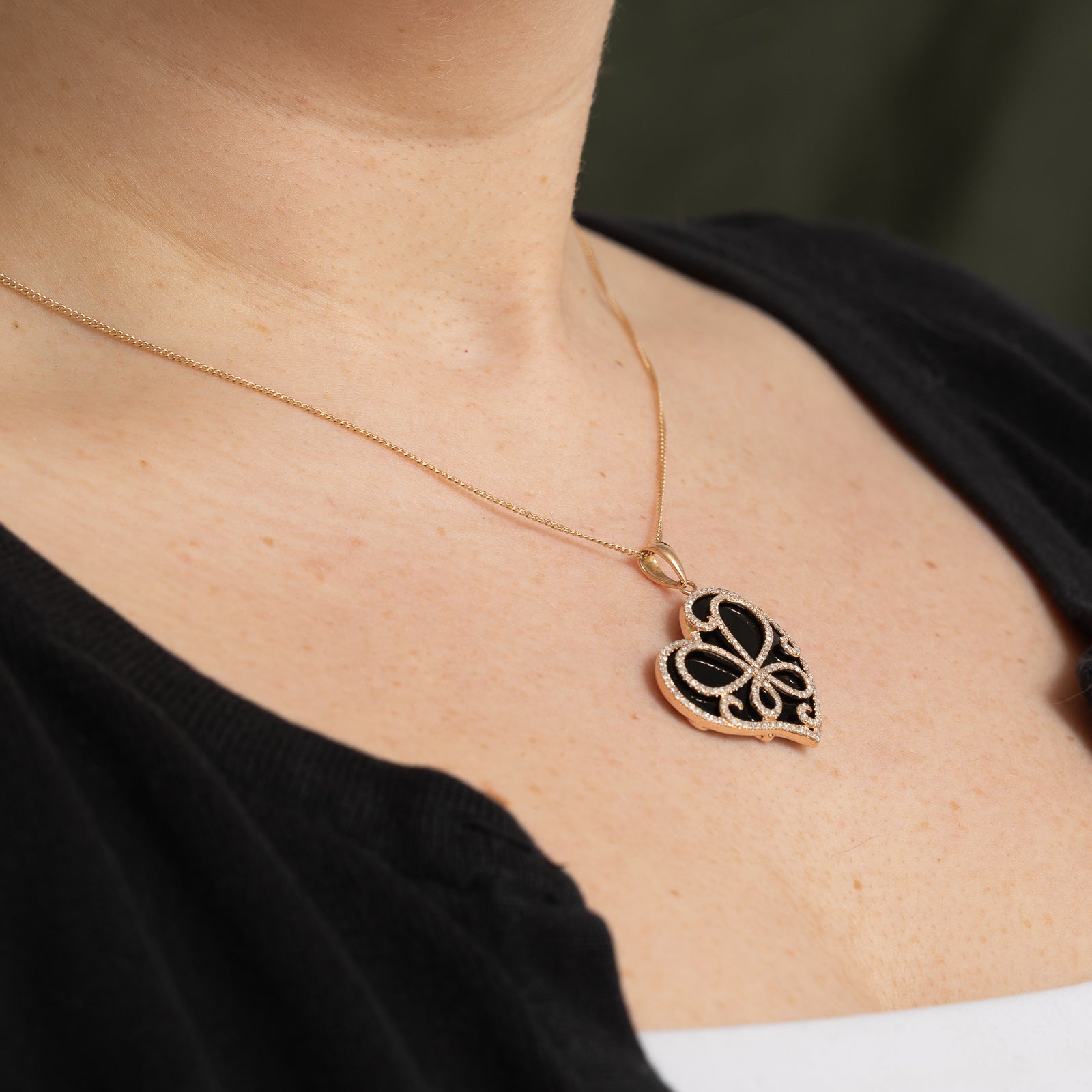 Onyx & Diamond Heart Pendant | 18.00ct, 0.40ctw