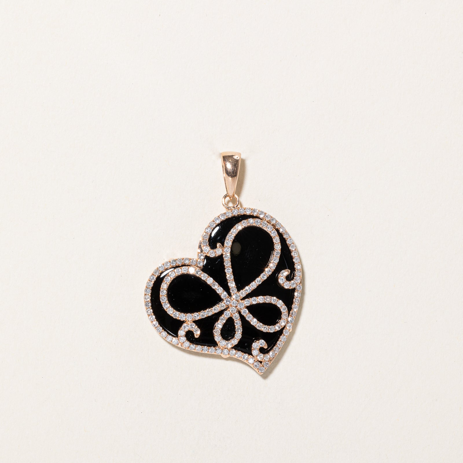 Onyx & Diamond Heart Pendant | 18.00ct, 0.40ctw