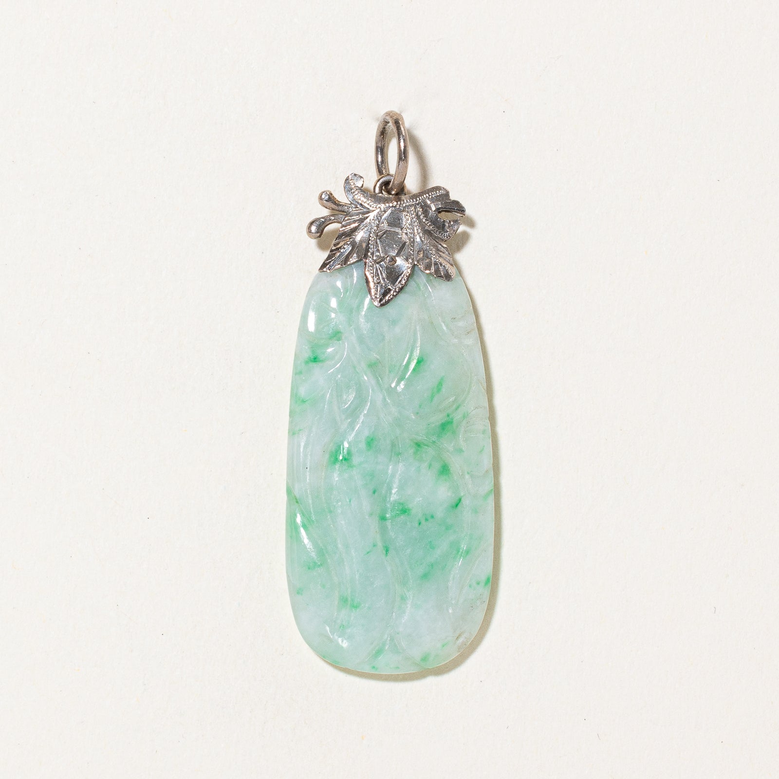 Carved Jadeite Pendant | 30.00ct