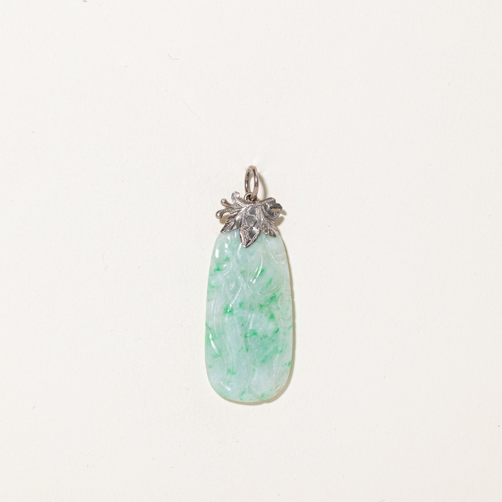 Carved Jadeite Pendant | 30.00ct