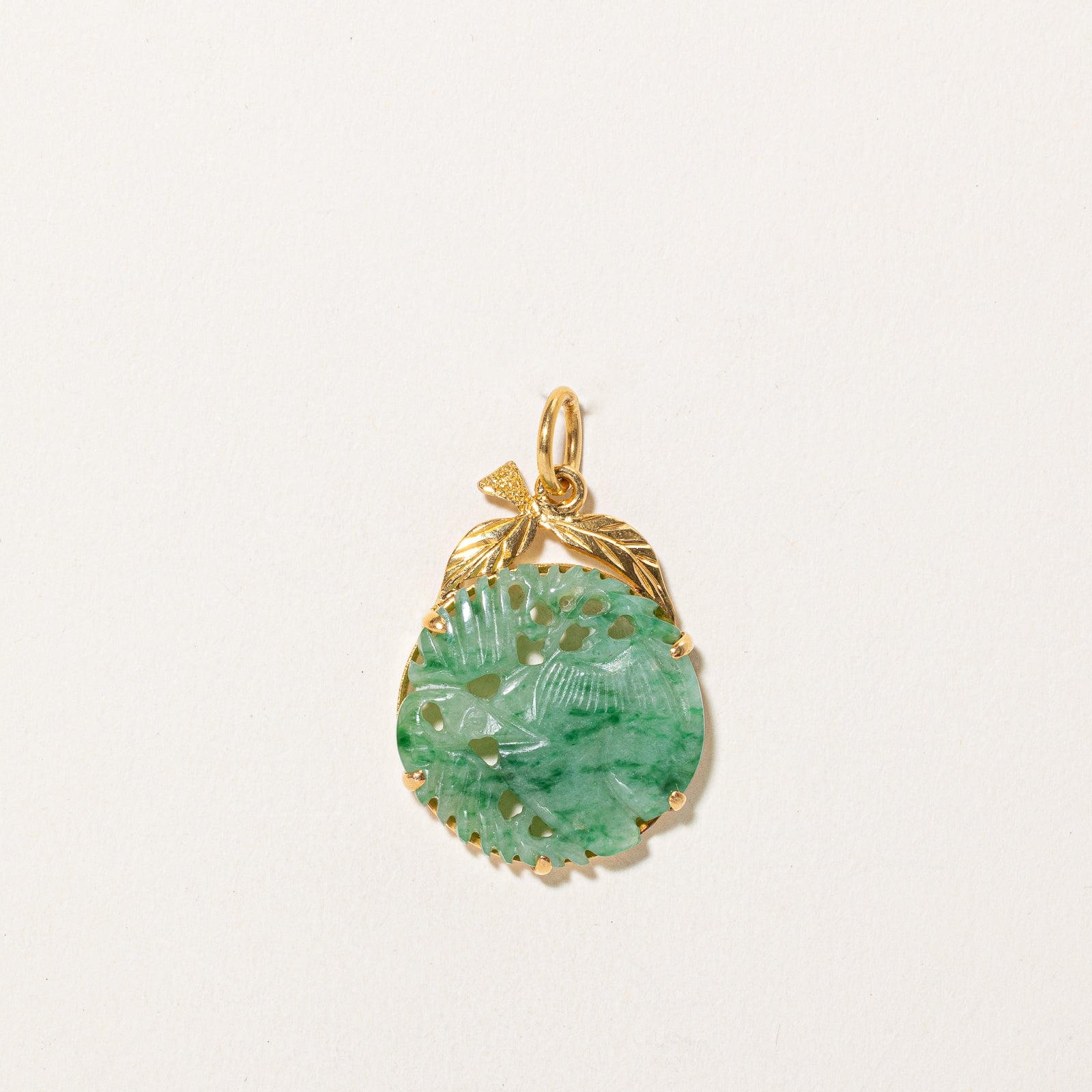 Carved Jadeite Circle Pendant | 12.00ct